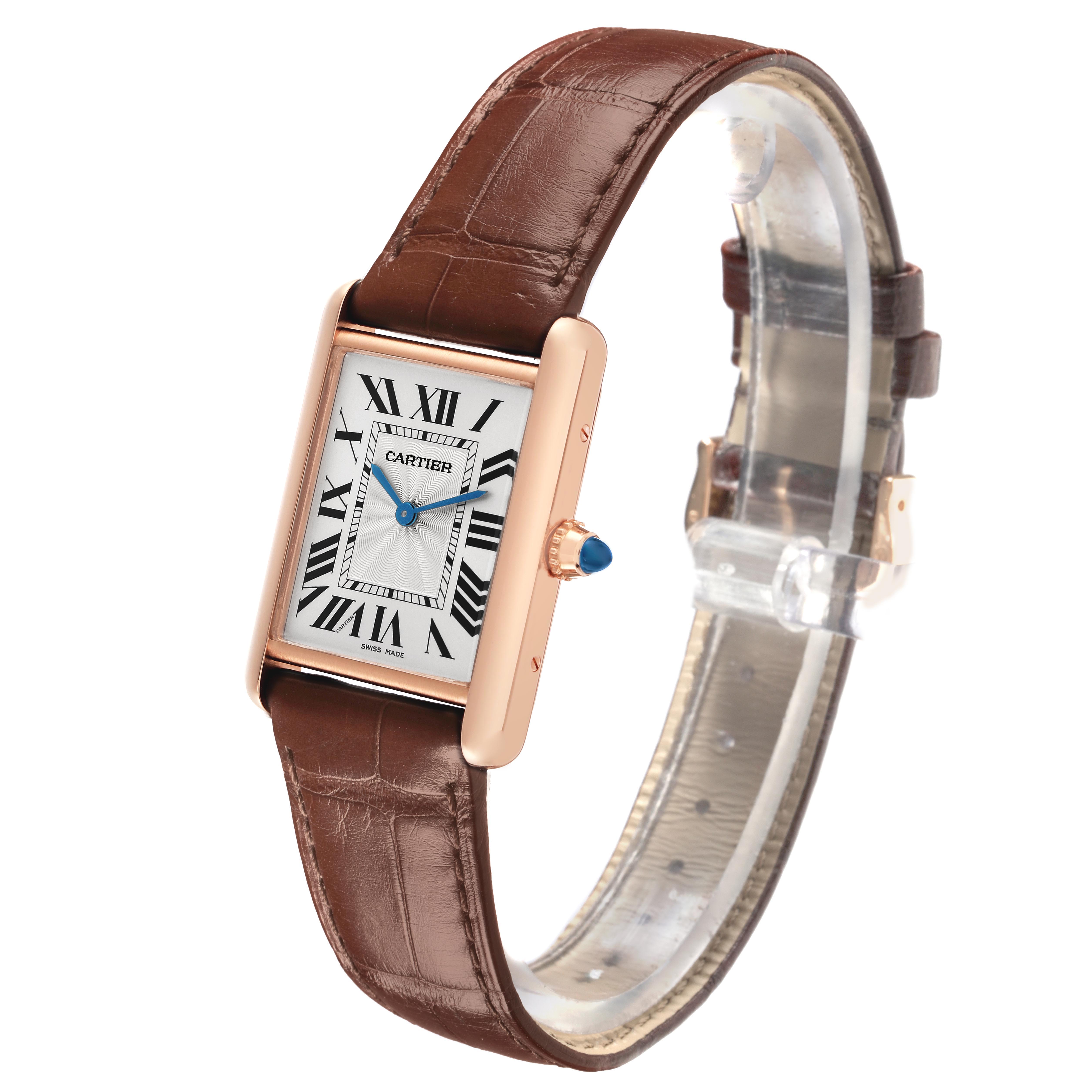 The Cartier Tank Louis WGTA0011 Men's Rose Gold Silver Dial WGTA0011 Men's Rose Gold Silver Dial watch is shown at an angle highlighting its face, crown, and brown leather strap.