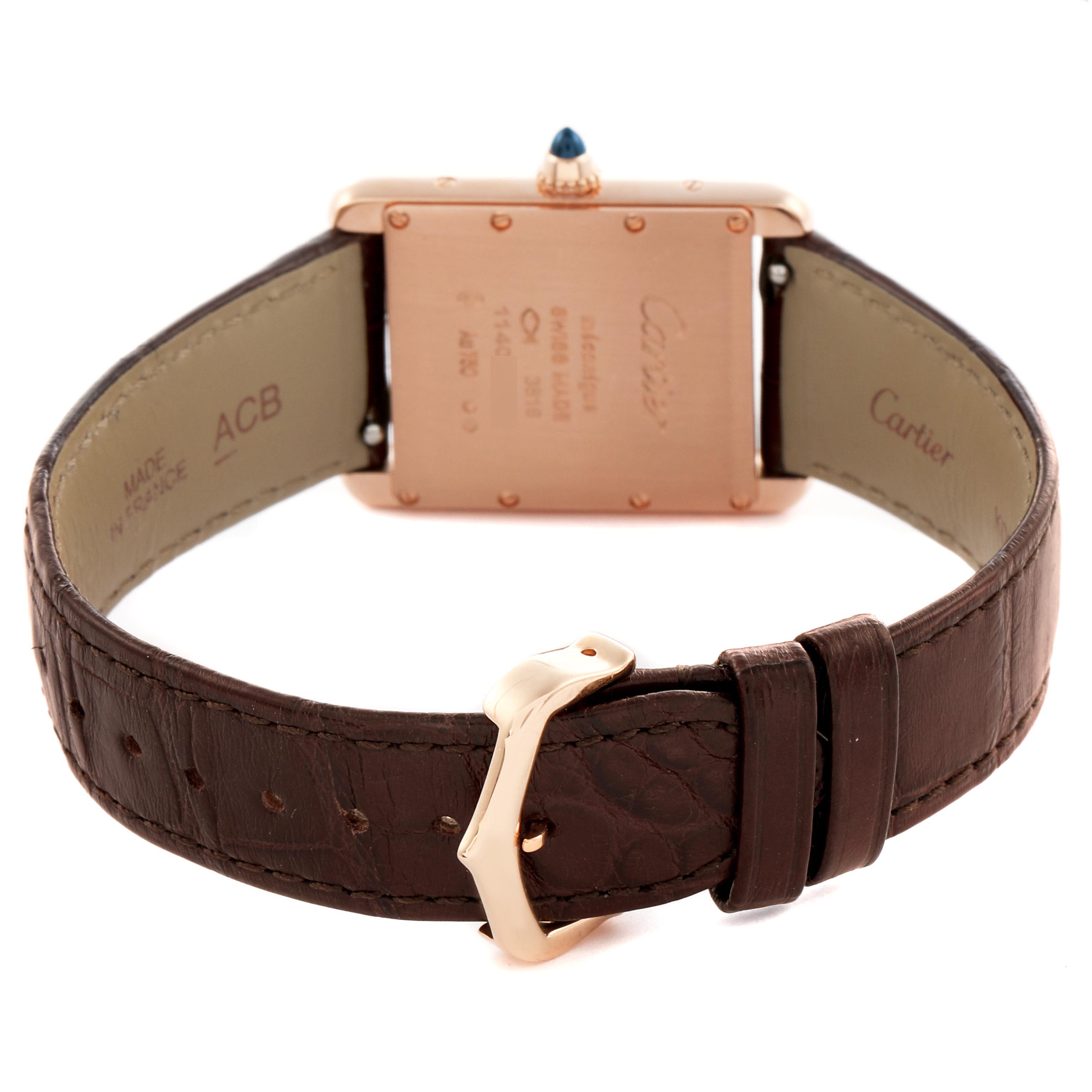 The image shows the back of a Cartier Tank Louis WGTA0011 Men's Rose Gold Silver Dial WGTA0011 Men's Rose Gold Silver Dial watch with its brown leather strap and buckle.