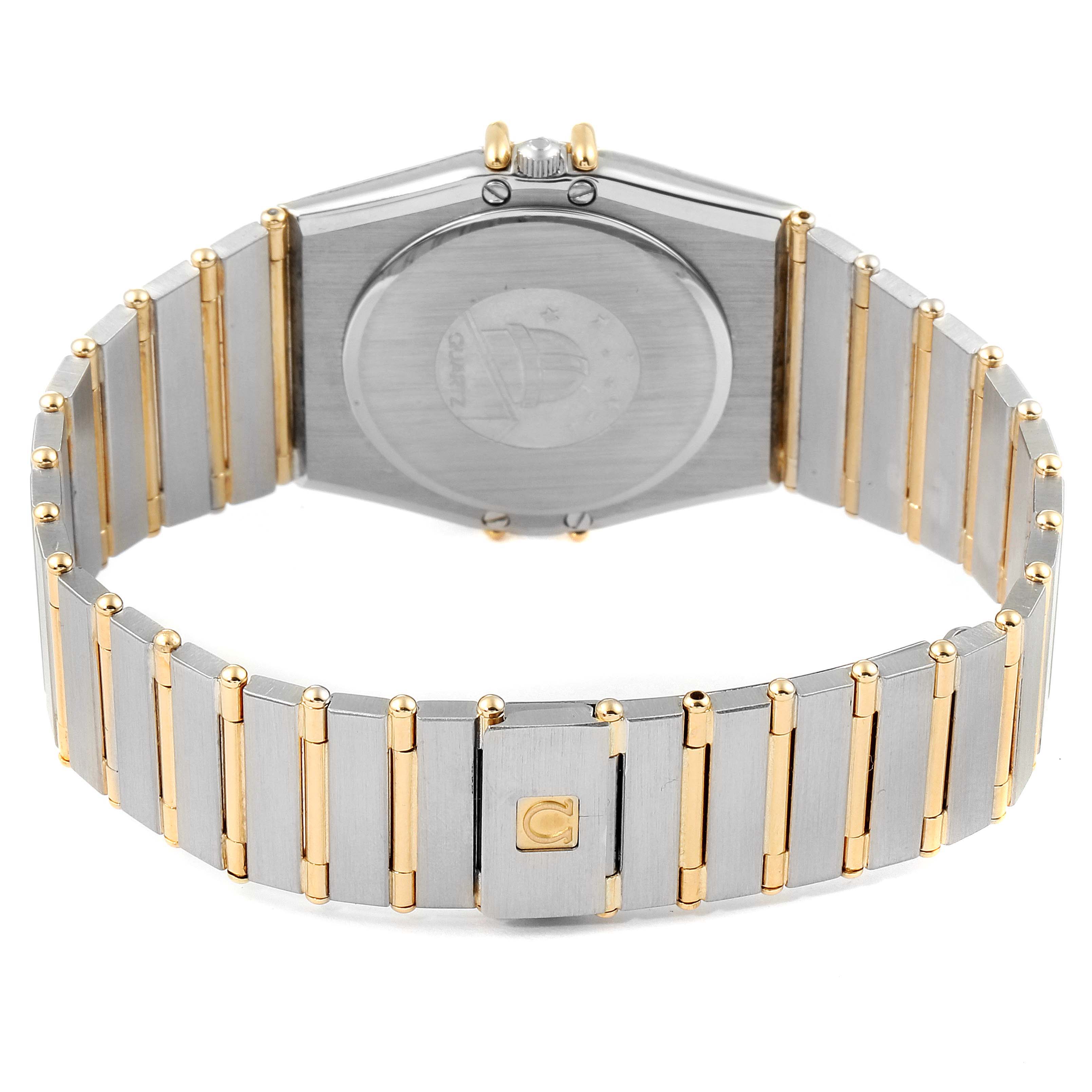 The image shows the back view of an Omega Constellation  Men's Steel and Gold (two tone) Black Dial  Men's Steel and Gold (two tone) Black Dial watch highlighting its bracelet and case back.