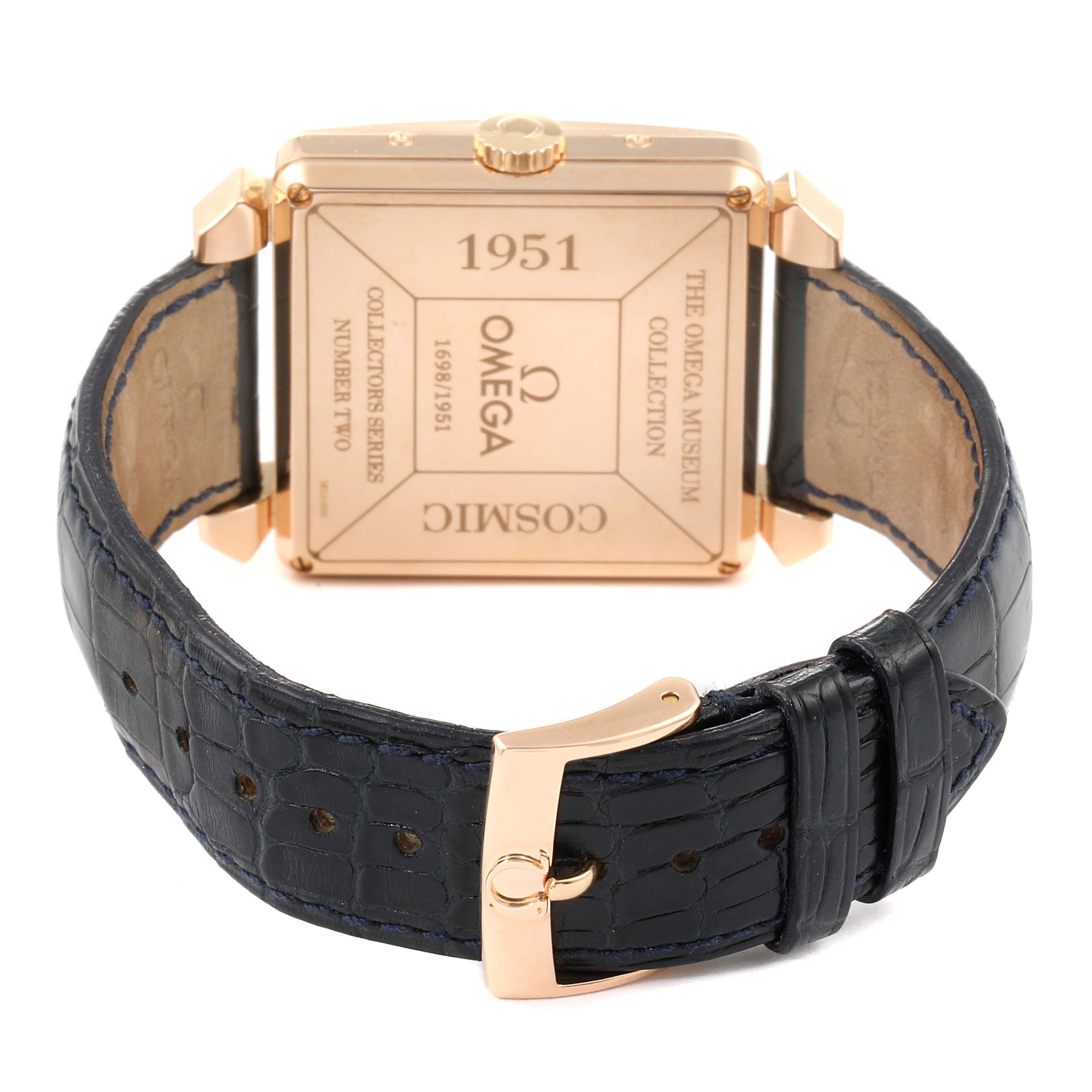 The image shows the back case and strap of an Omega Museum 5701.80.03 Men's Rose Gold Blue Dial 5701.80.03 Men's Rose Gold Blue Dial Collection wristwatch, model Cosmic, with a black leather strap and gold-tone case.