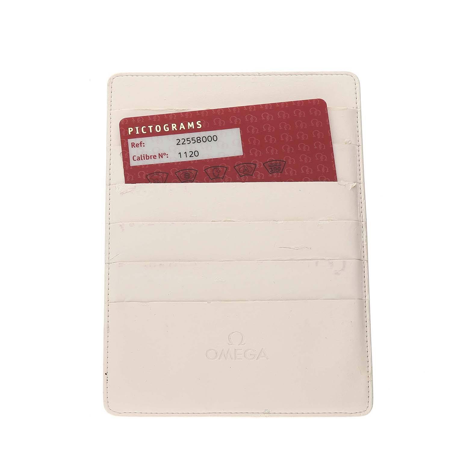 The image shows a red Omega pictogram card placed inside a white Omega cardholder for the Seamaster model.