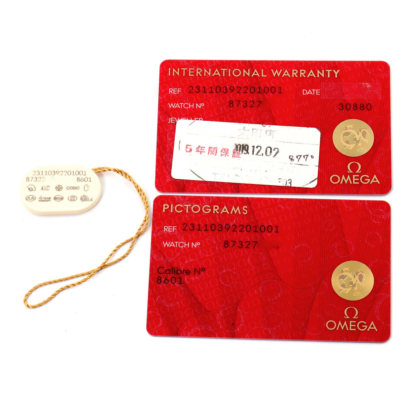 The image shows two red cards and a tag for an Omega Aqua Terra 231.10.39.22.01.001 Men's Stainless Steel Black Dial 231.10.39.22.01.001 Men's Stainless Steel Black Dial watch, indicating warranty and pictograms information.