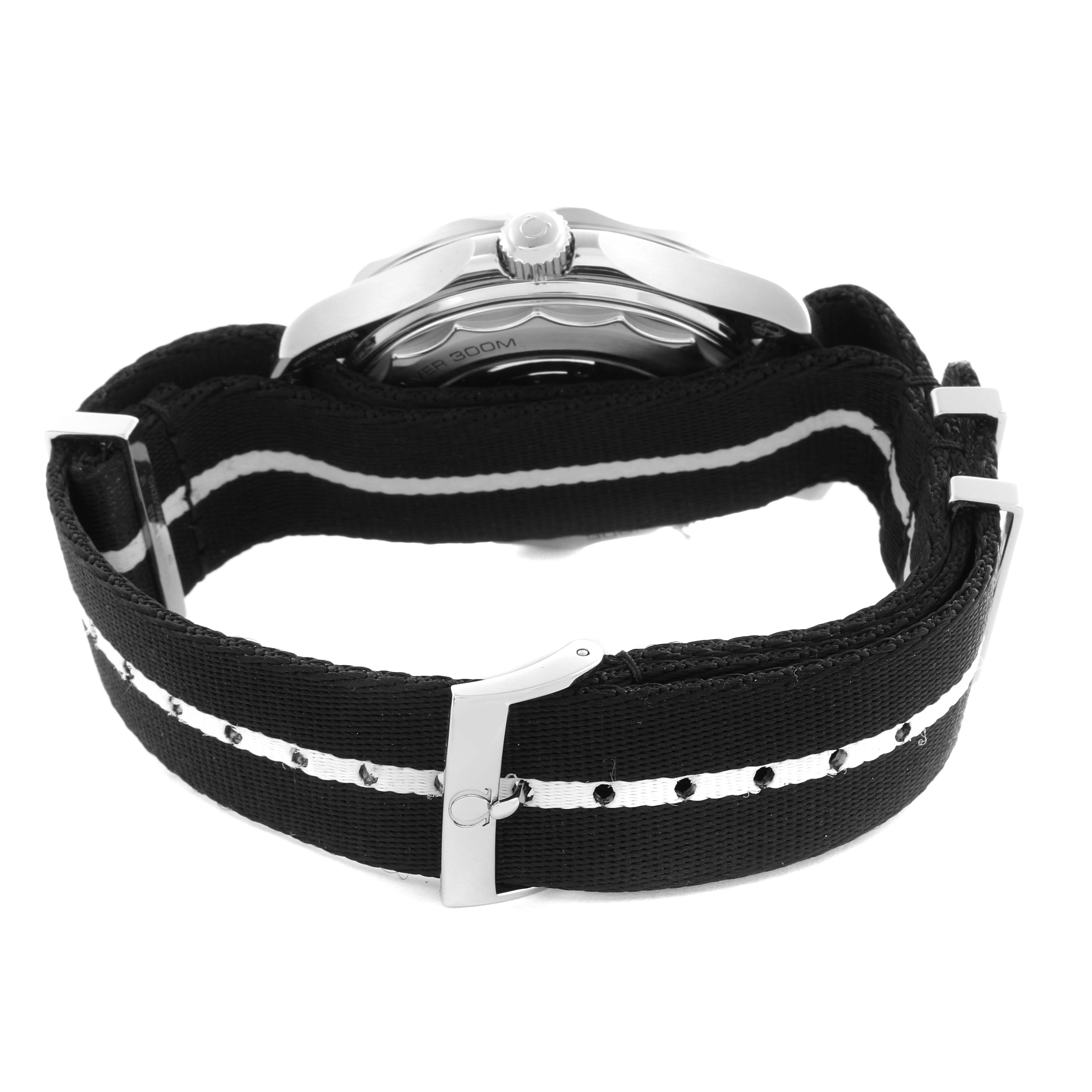 The Omega Seamaster 210.32.42.20.04.001 Men's Stainless Steel White Dial 210.32.42.20.04.001 Men's Stainless Steel White Dial is shown from the side, highlighting the crown and black strap with a white stripe.