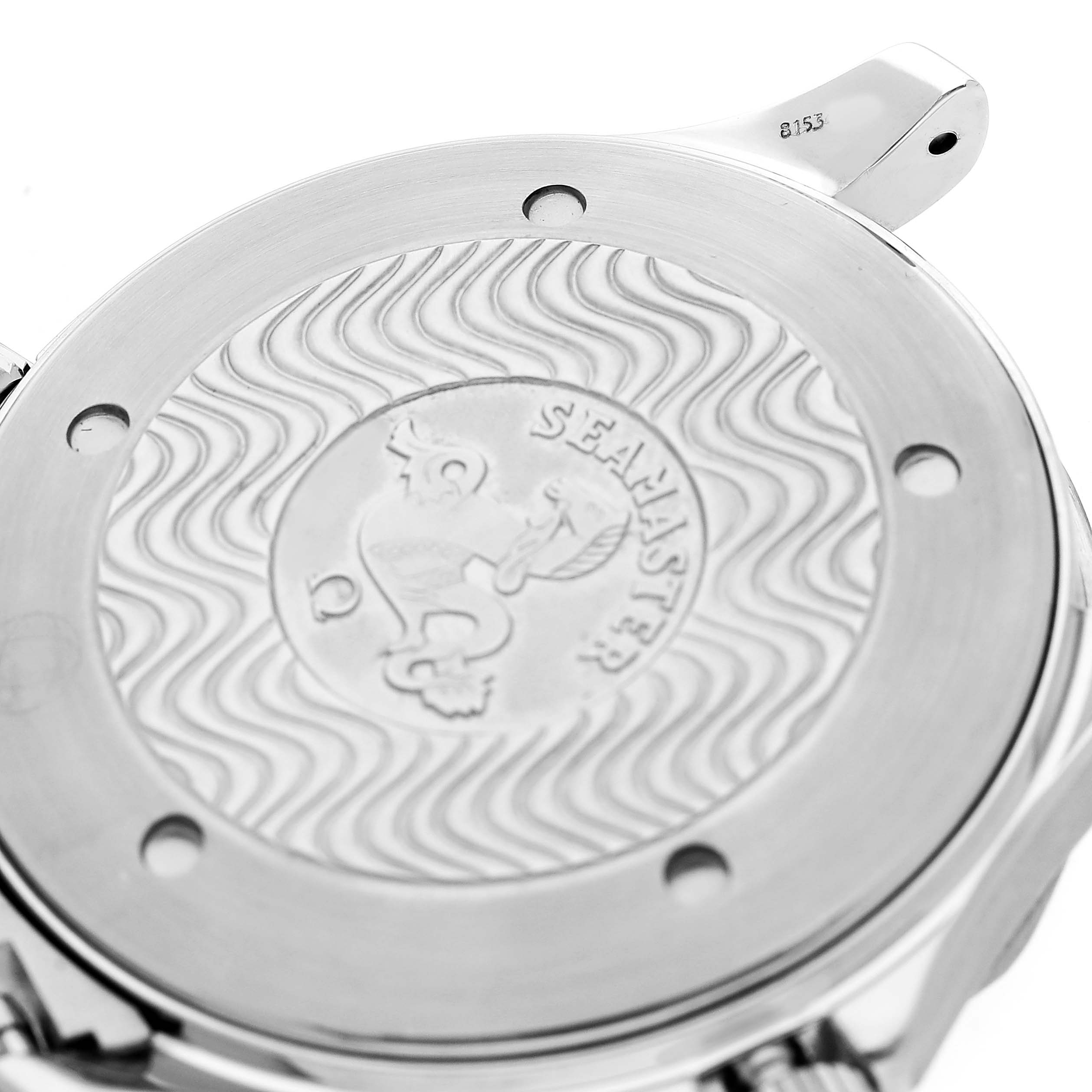 The image shows the back case of an Omega Seamaster 2254.50.00 Men's Stainless Steel Black Dial watch with engravings and wave patterns.