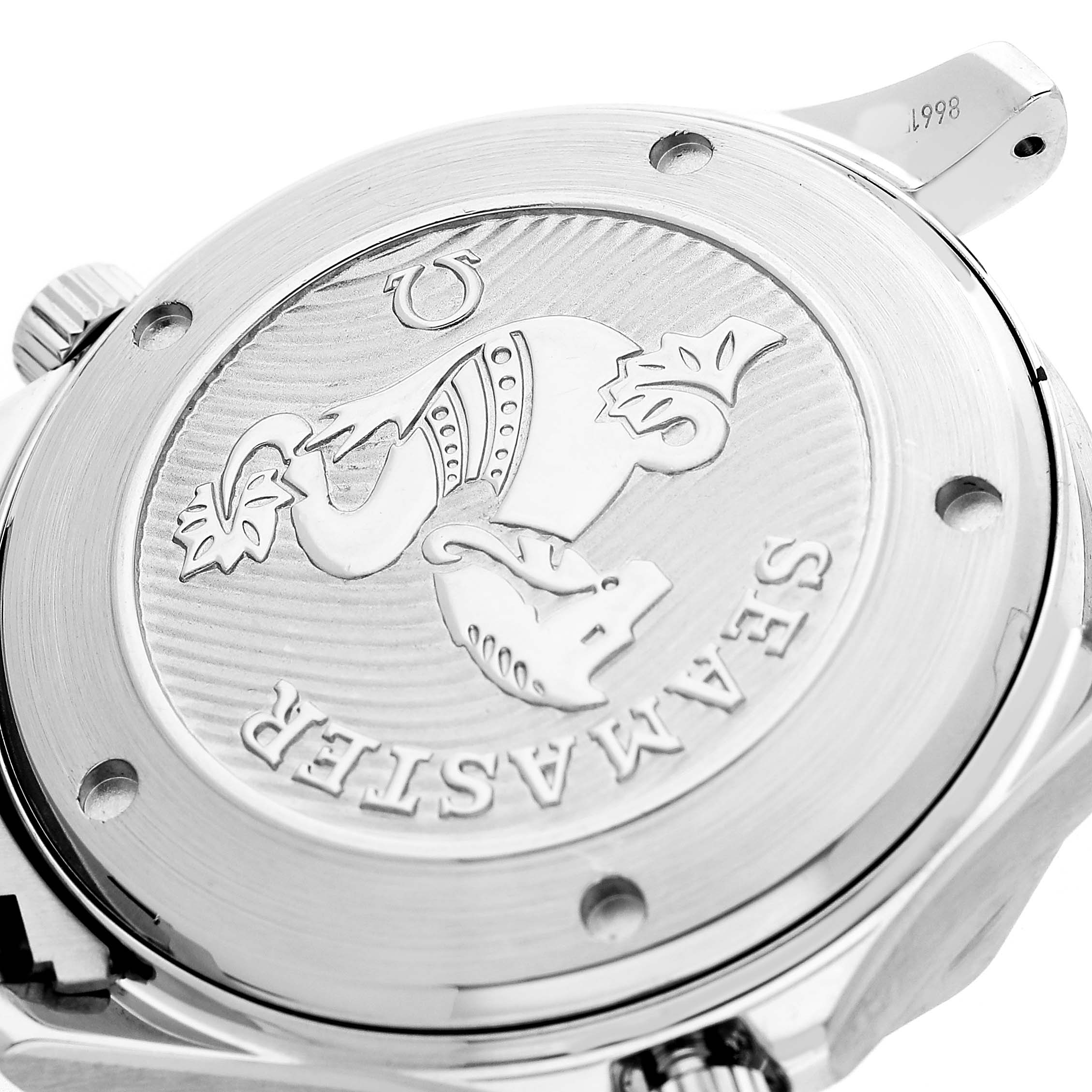 The image shows the back of an Omega Seamaster 212.30.41.20.03.001 Men's Stainless Steel Blue Dial watch, highlighting the engraved emblem.