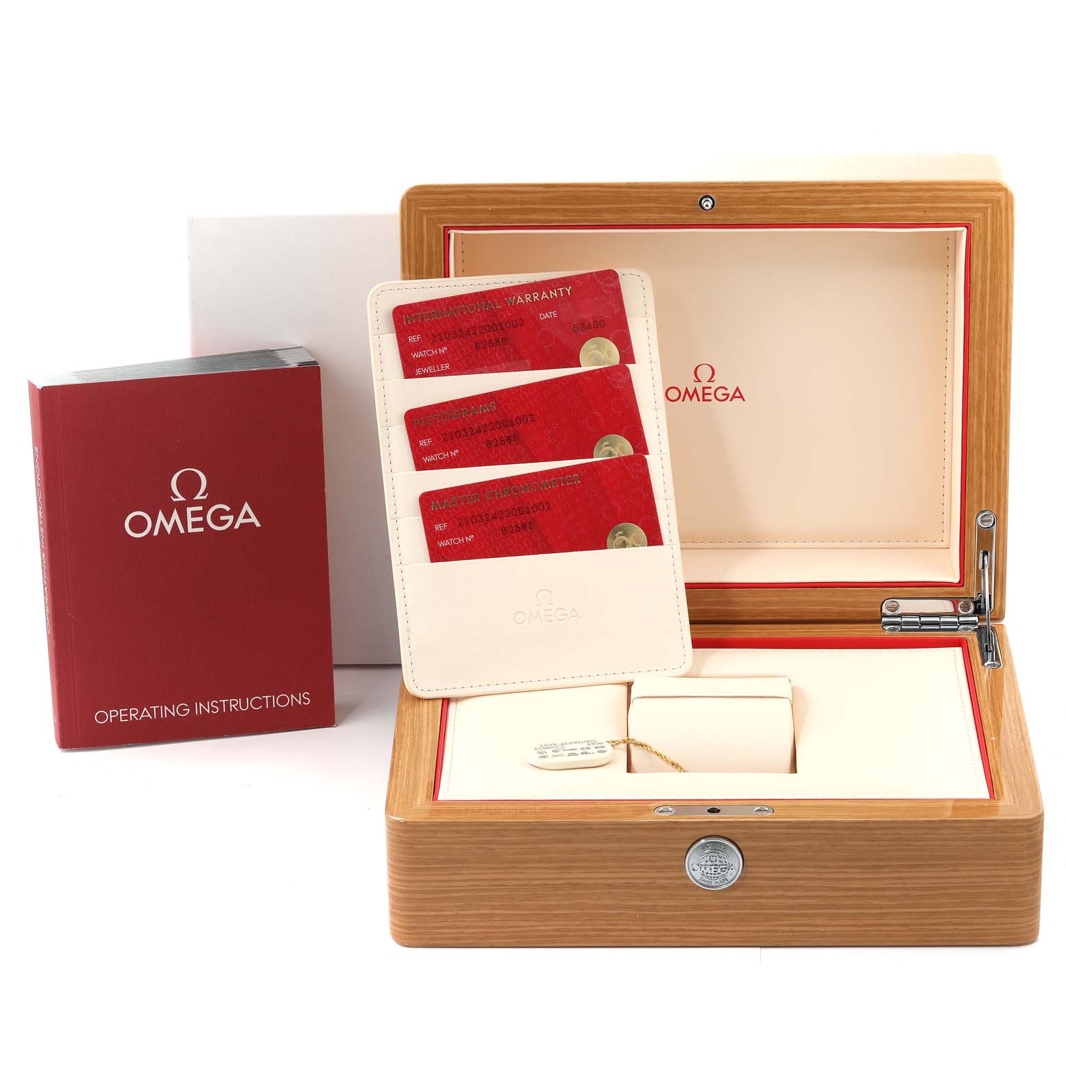 The image shows the accessories of an Omega Seamaster 210.32.42.20.01.002 Men
s Stainless Steel Black Dial 210.32.42.20.01.002 Men
s Stainless Steel Black Dial, including the watch box, warranty cards, and operating instructions.