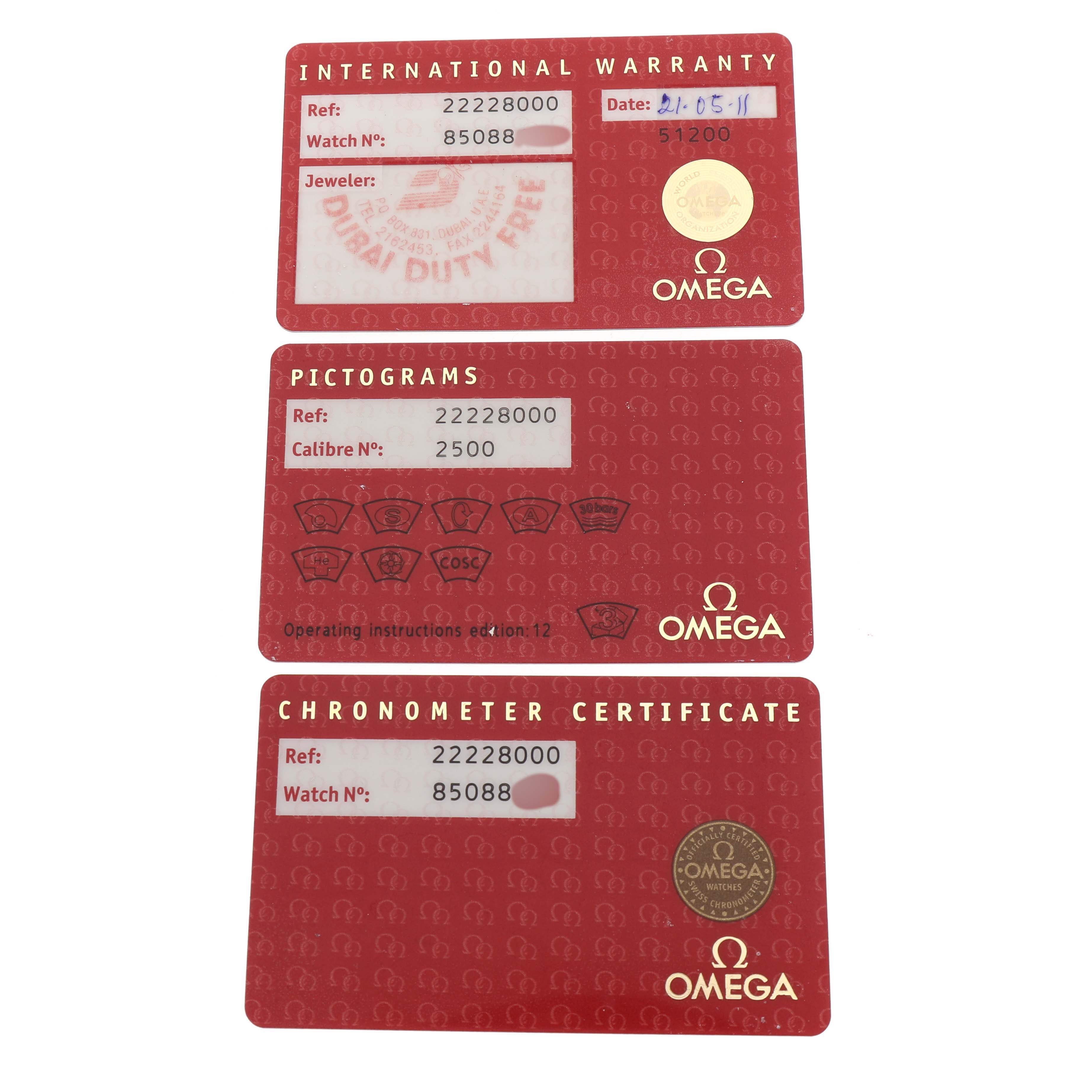 The image shows warranty, pictogram, and chronometer certificate cards for an Omega Seamaster 2222.80.00 Men's Stainless Steel Blue Dial watch.