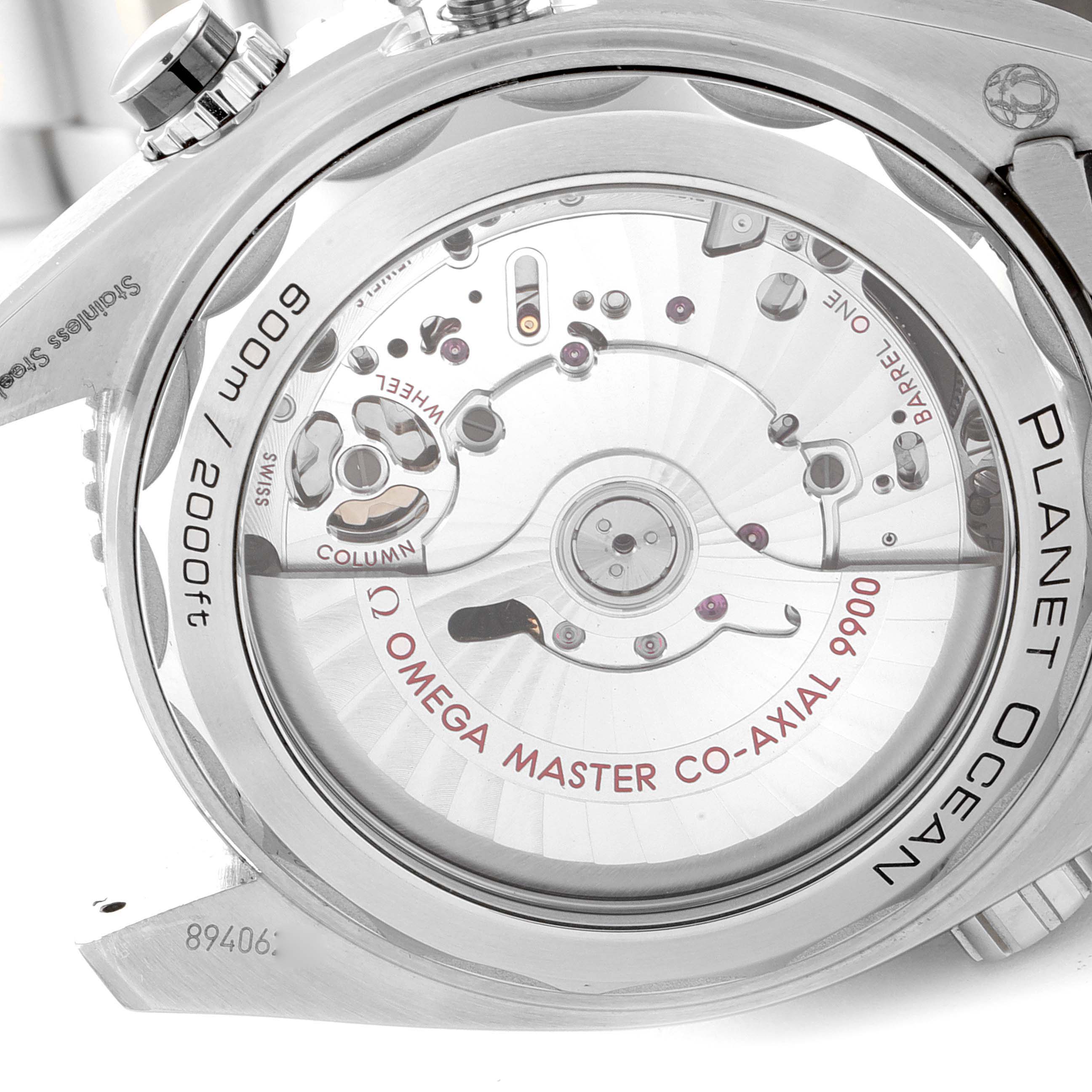 The image shows the back view of the Omega Planet Ocean 215.30.46.51.01.001 Men's Stainless Steel Black Dial 215.30.46.51.01.001 Men's Stainless Steel Black Dial watch, highlighting its movement and engraving.