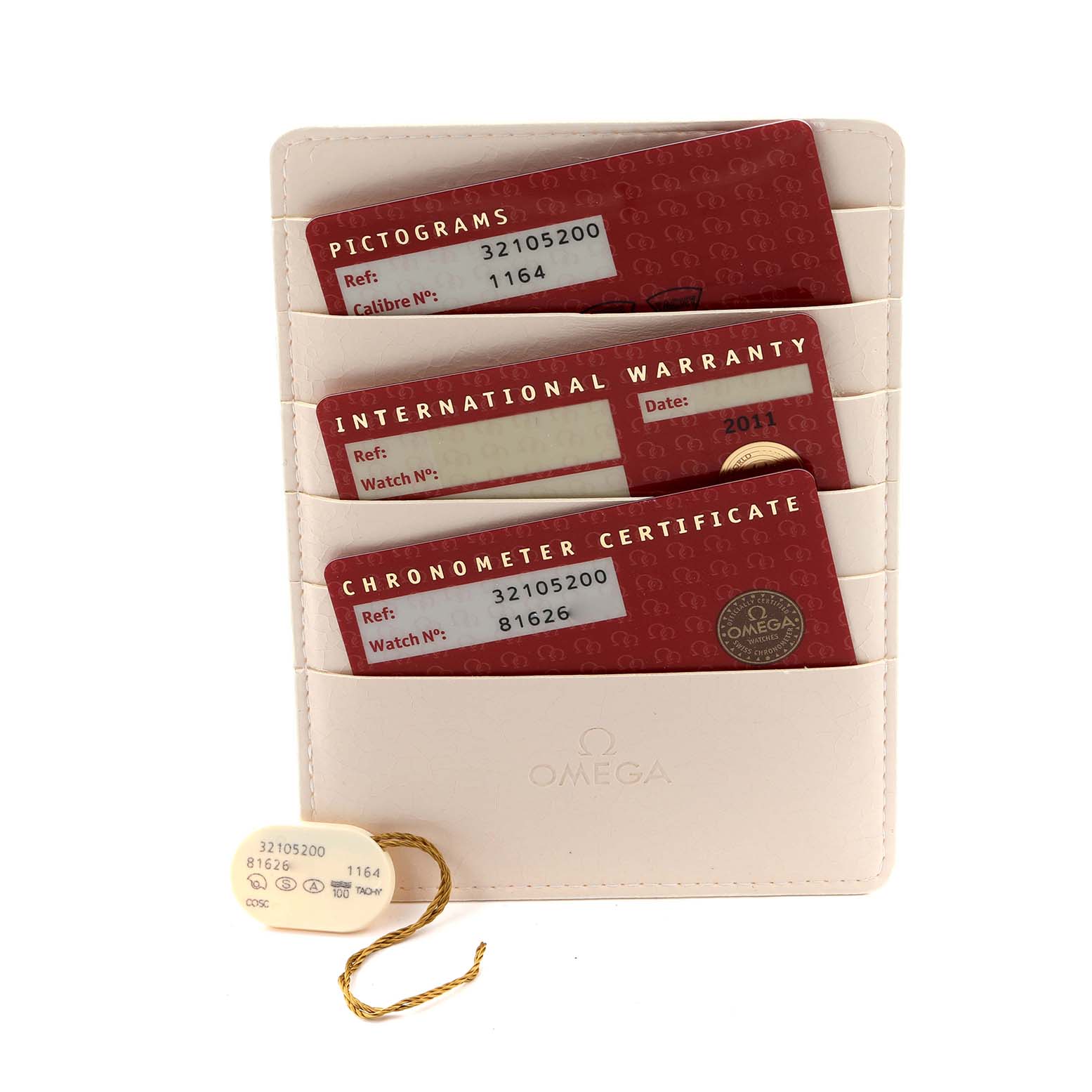 The image shows three Omega Speedmaster 3210.52.00 Men
s Stainless Steel Black Dial 3210.52.00 Men
s Stainless Steel Black Dial model cards: Pictograms, International Warranty, and Chronometer Certificate, in a holder.