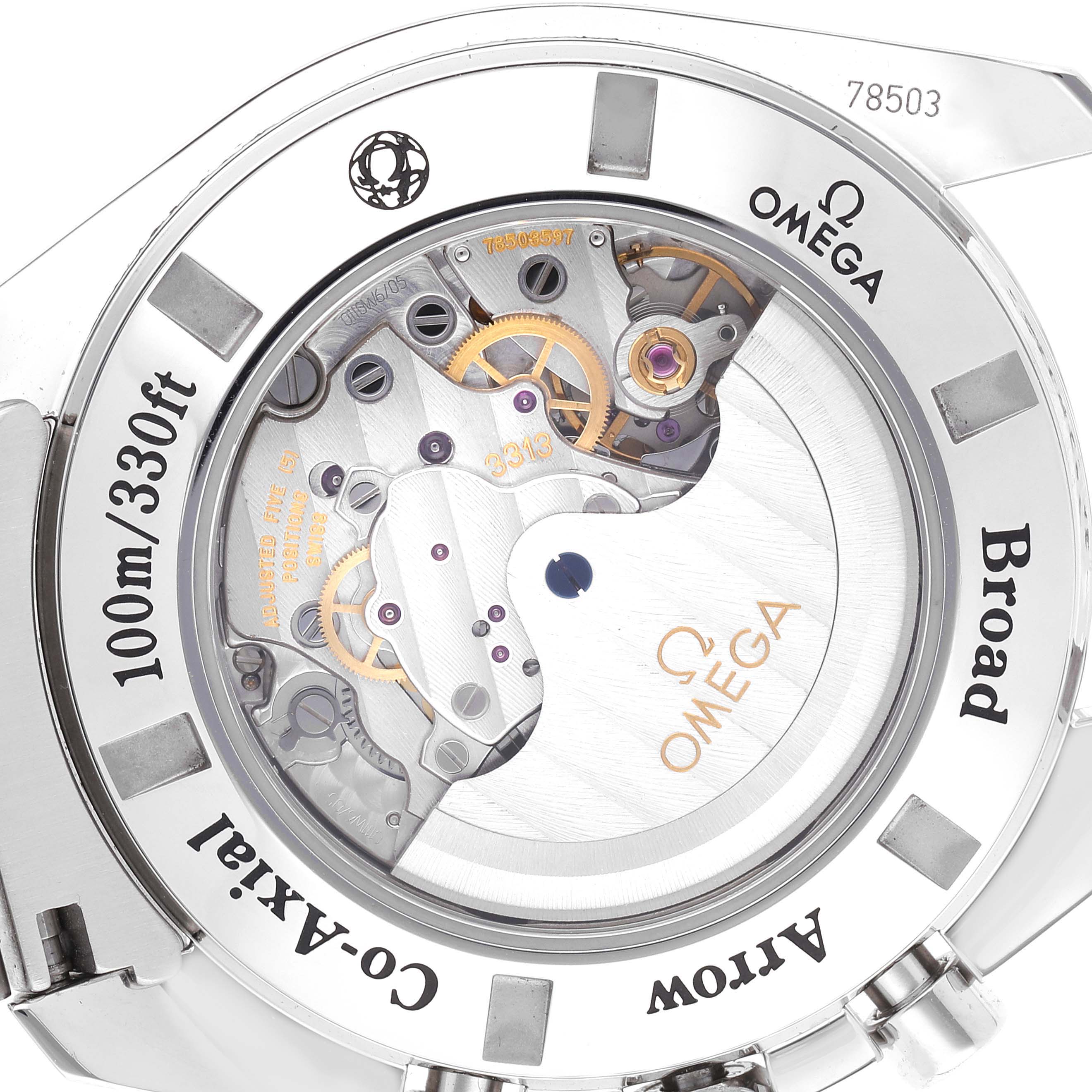 The image shows the back of an Omega Speedmaster 321.10.44.50.02.001 Men
s Stainless Steel Silver Dial 321.10.44.50.02.001 Men
s Stainless Steel Silver Dial watch, highlighting its Co-Axial movement mechanism and detailed engravings.