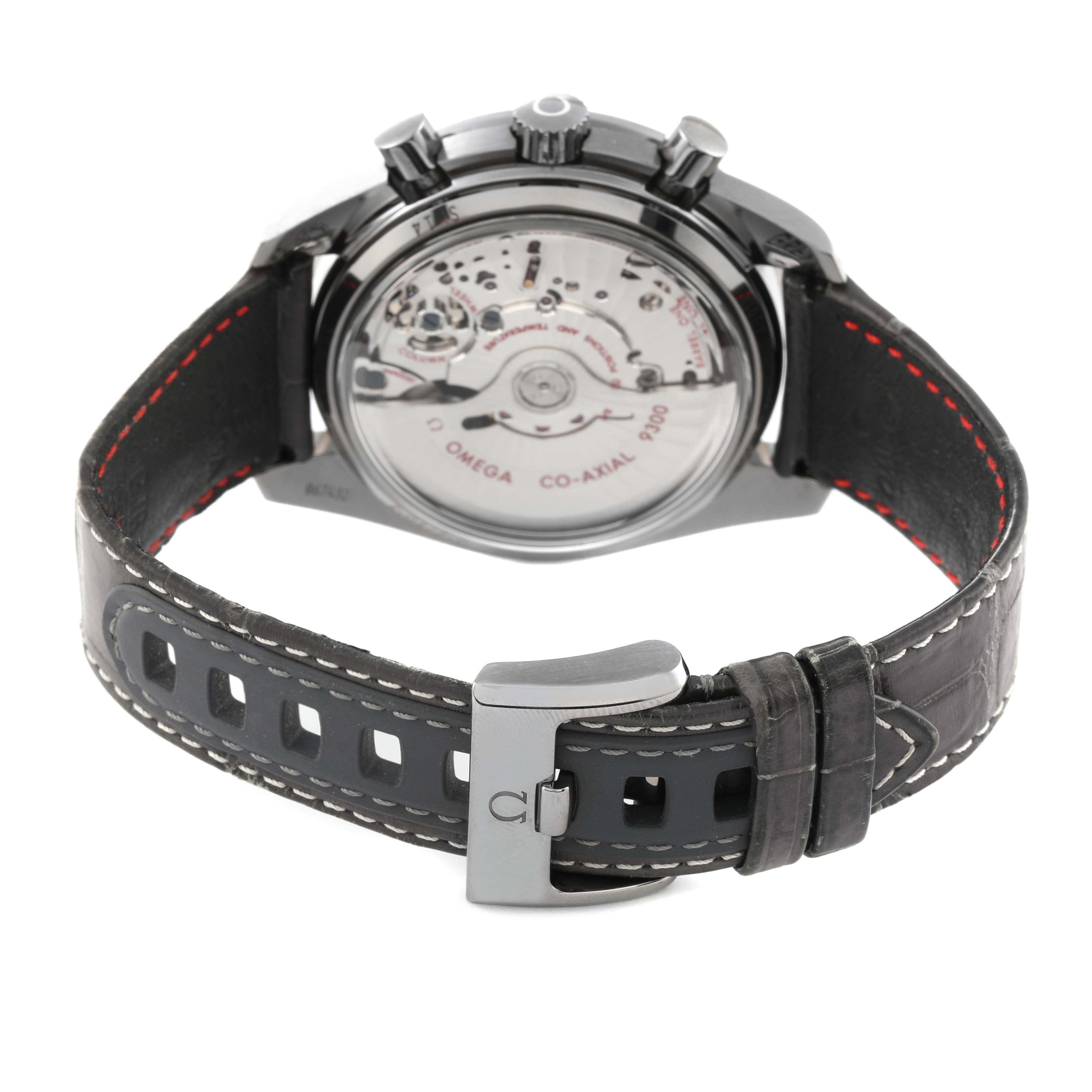 The image shows the back view of an Omega Speedmaster 311.93.44.51.99.001 Men's Ceramic Silver Dial 311.93.44.51.99.001 Men's Ceramic Silver Dial watch, highlighting its movement and leather strap.