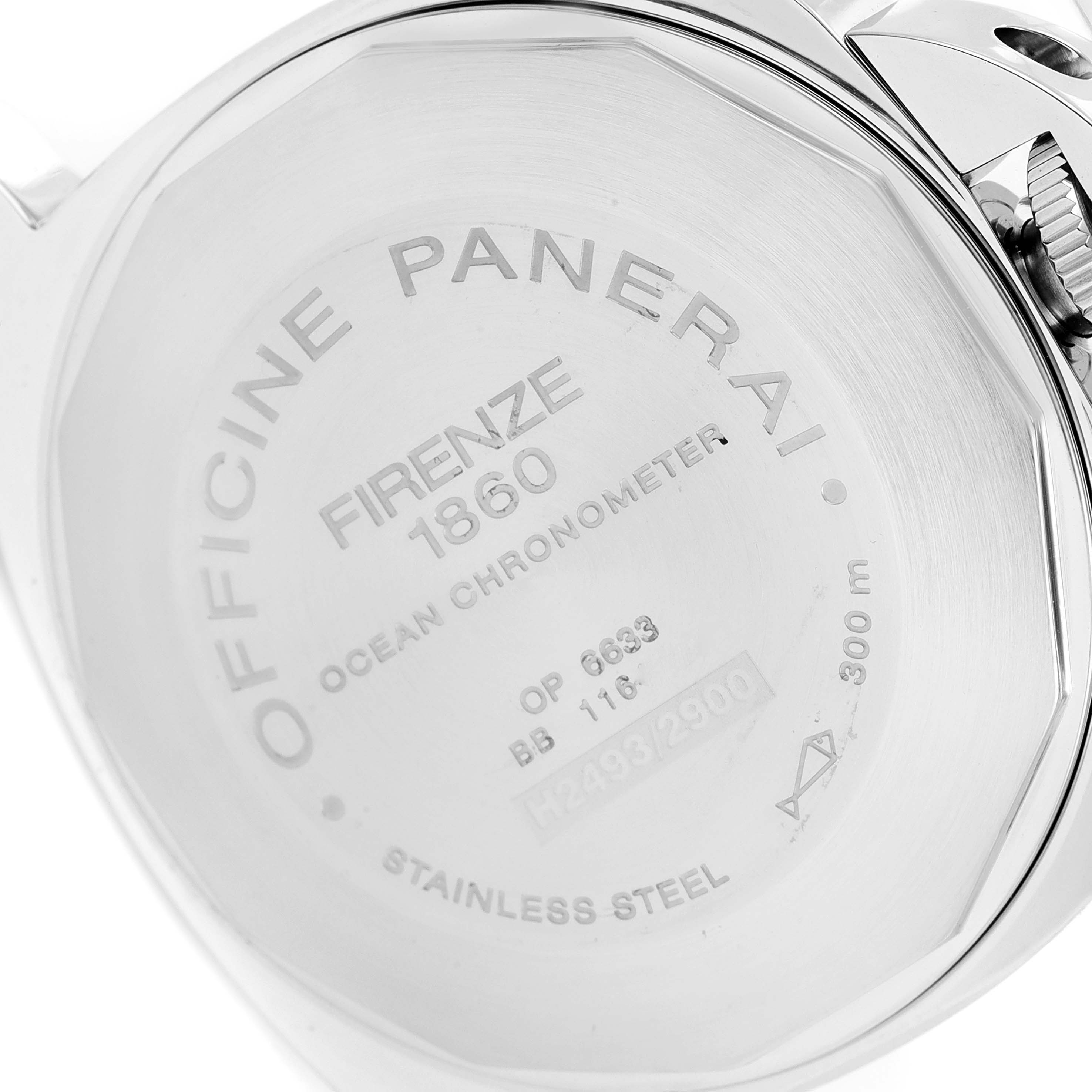 The image shows the back case of the Luminor model by Panerai, featuring engraved details.