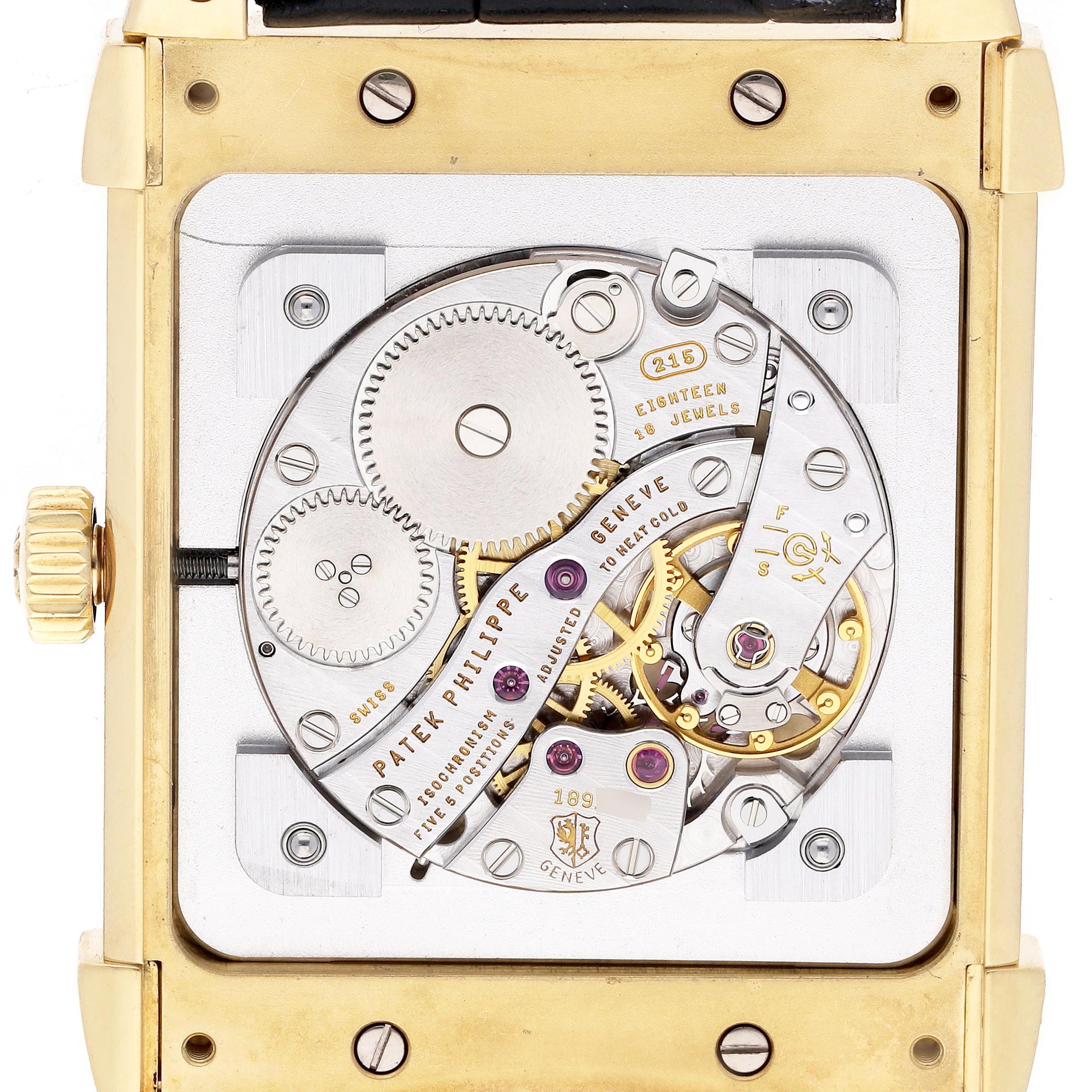 The image shows the back of a Patek Philippe Gondolo 5111J-001 Men's Yellow Gold Silver Dial 5111J-001 Men's Yellow Gold Silver Dial watch featuring its intricate mechanical movement.