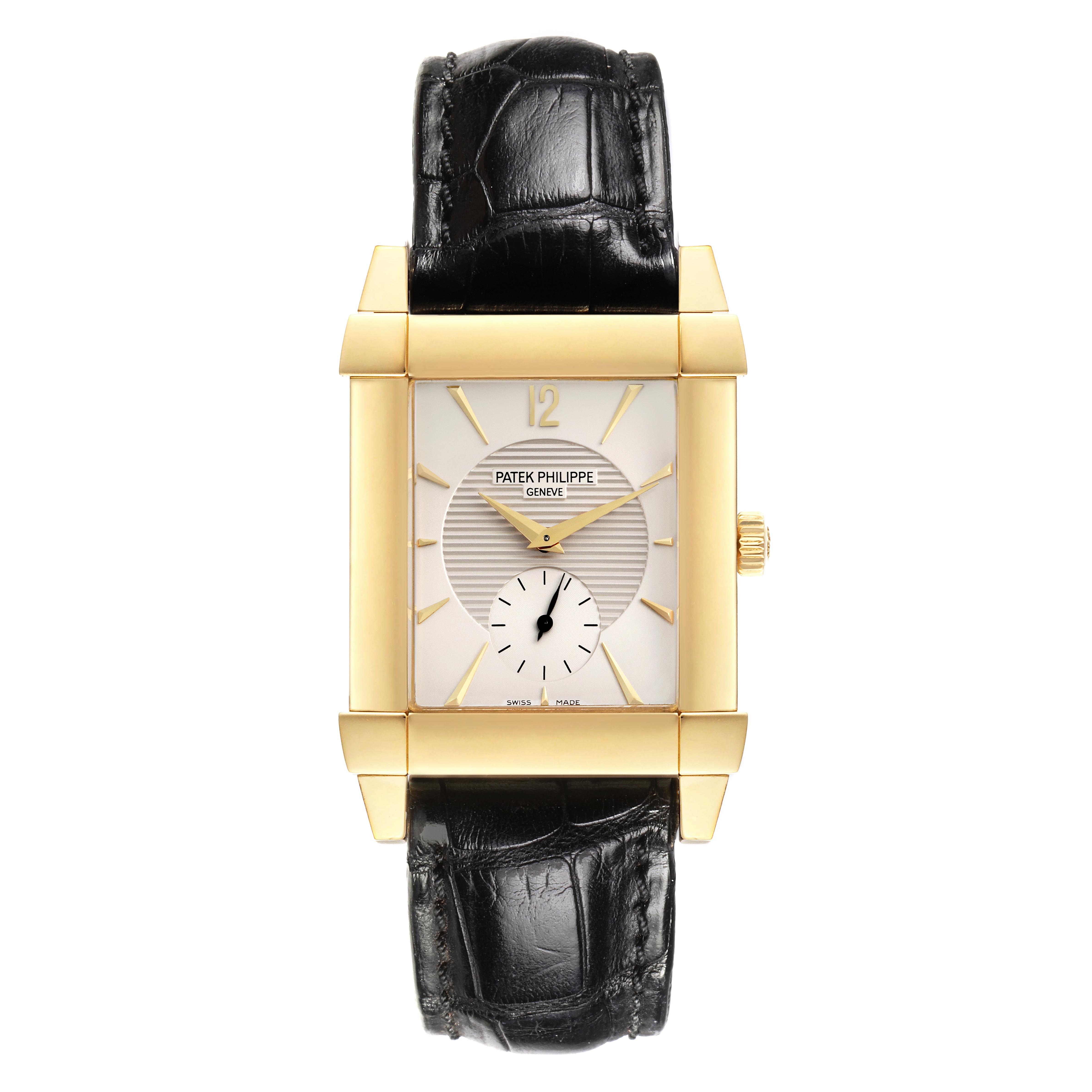 The Patek Philippe Gondolo 5111J-001 Men's Yellow Gold Silver Dial 5111J-001 Men's Yellow Gold Silver Dial watch is shown from a top-down angle, displaying the face, case, crown, and leather strap.
