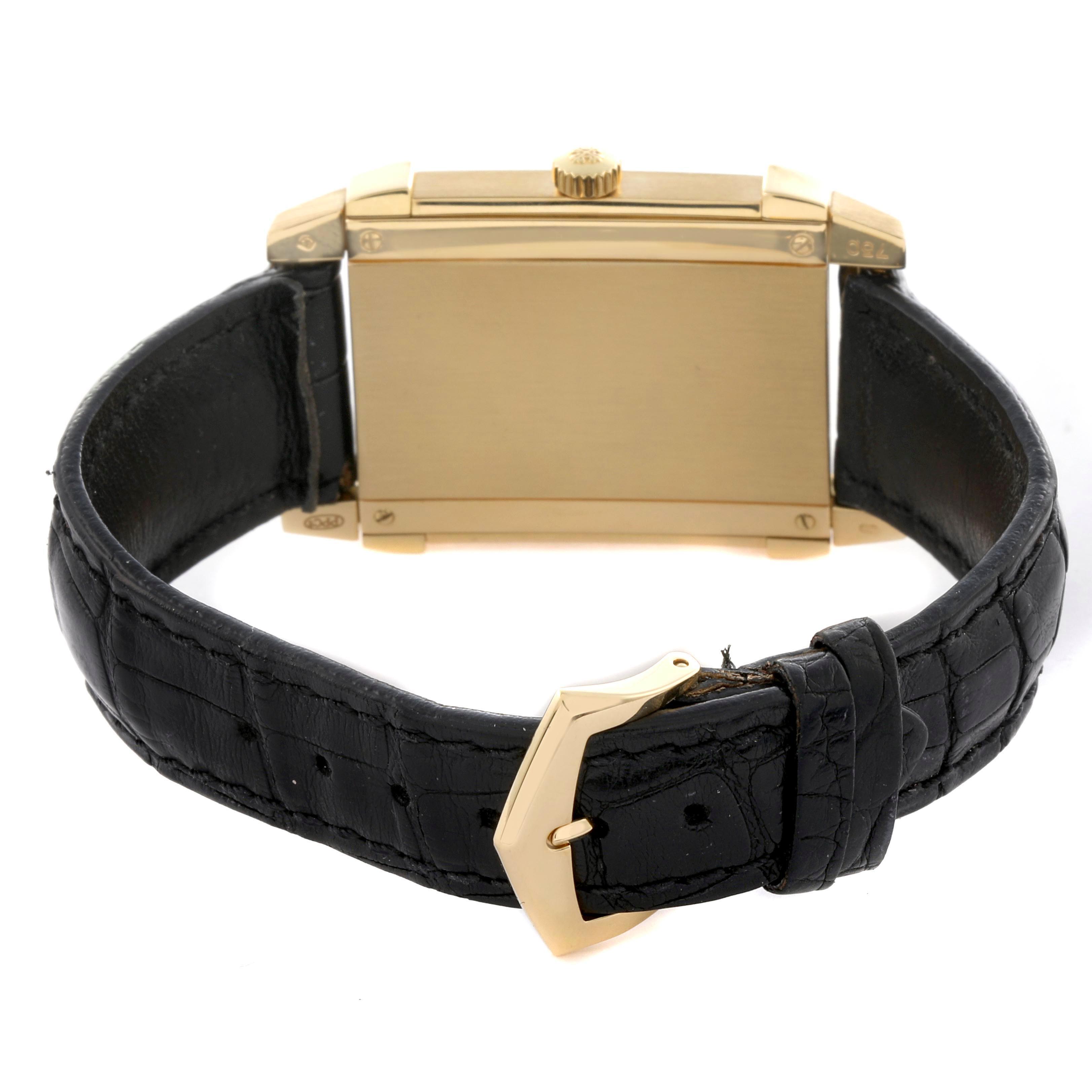 The image shows the back and side of a Patek Philippe Gondolo 5111J-001 Men's Yellow Gold Silver Dial 5111J-001 Men's Yellow Gold Silver Dial watch, highlighting the case, crown, and black leather strap with a gold buckle.