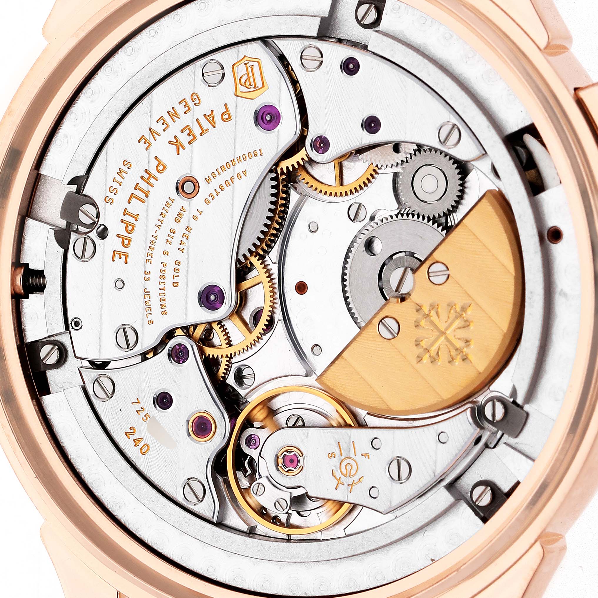 The image shows the intricate movement of a Patek Philippe Complications 5230R-001 Men's Rose Gold Grey Dial watch from a top-down angle.