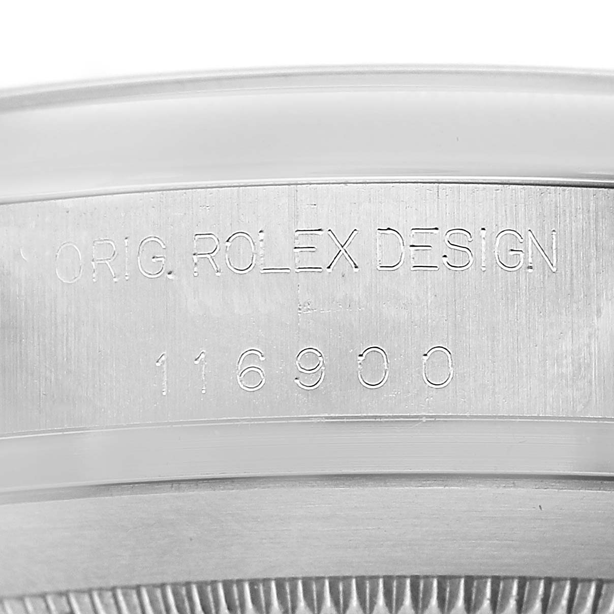The image shows the side engraving of a Rolex Air-King 116900 Men's Stainless Steel Black Dial, highlighting the model number "116900."