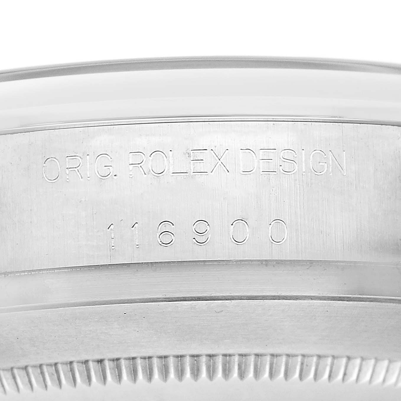 The image shows an angled view of the Rolex Air-King 116900 Men's Stainless Steel Black Dial's side, focusing on the engraved serial number on the case.