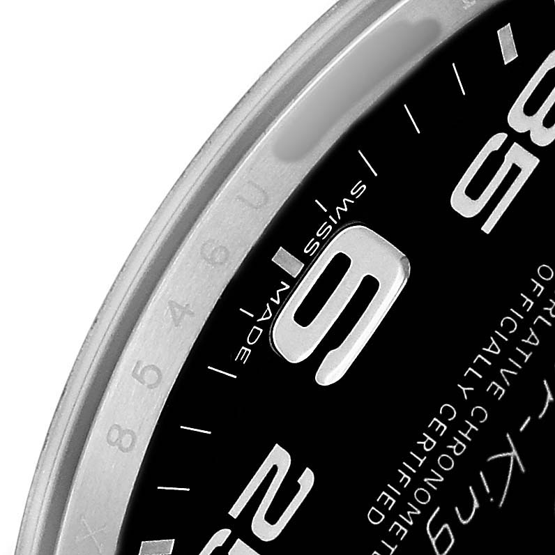 The image shows a close-up of the Rolex Air-King 116900 Men's Stainless Steel Black Dial's dial, highlighting the 9 and 3 numerals and part of the bezel.