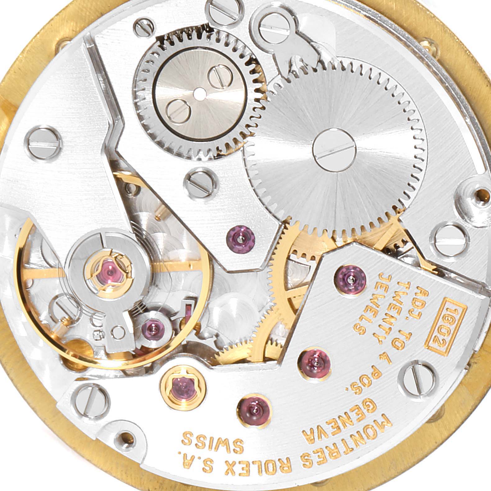 The image shows a close-up of the movement mechanism of a Rolex Cellini 5109 Women's Yellow Gold Mother of Pearl Dial 5109 Women's Yellow Gold Mother of Pearl Dial watch, highlighting gears and jewels.