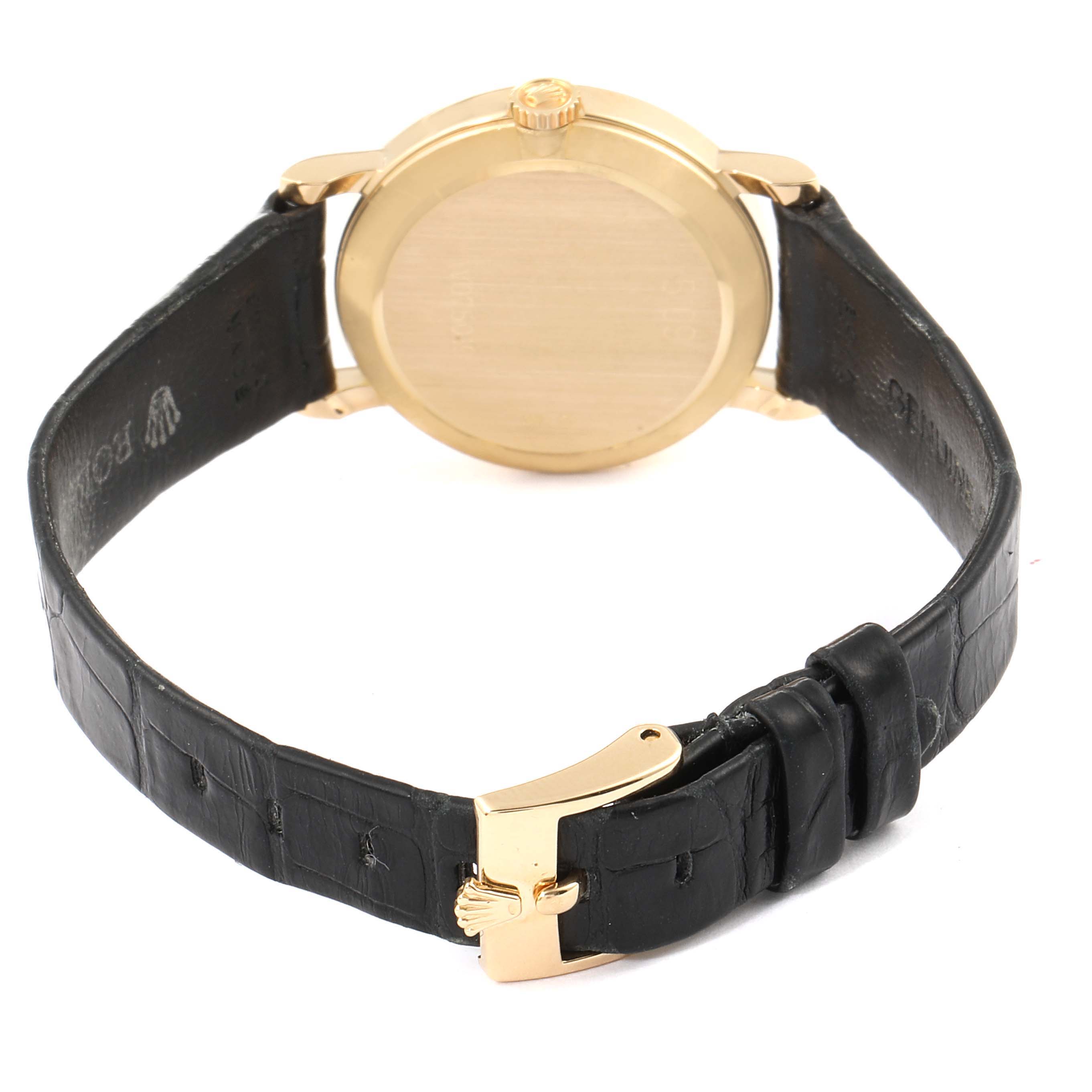 The image shows the back view of a Rolex Cellini 5109 Women's Yellow Gold Mother of Pearl Dial 5109 Women's Yellow Gold Mother of Pearl Dial watch, highlighting its leather strap and gold clasp.