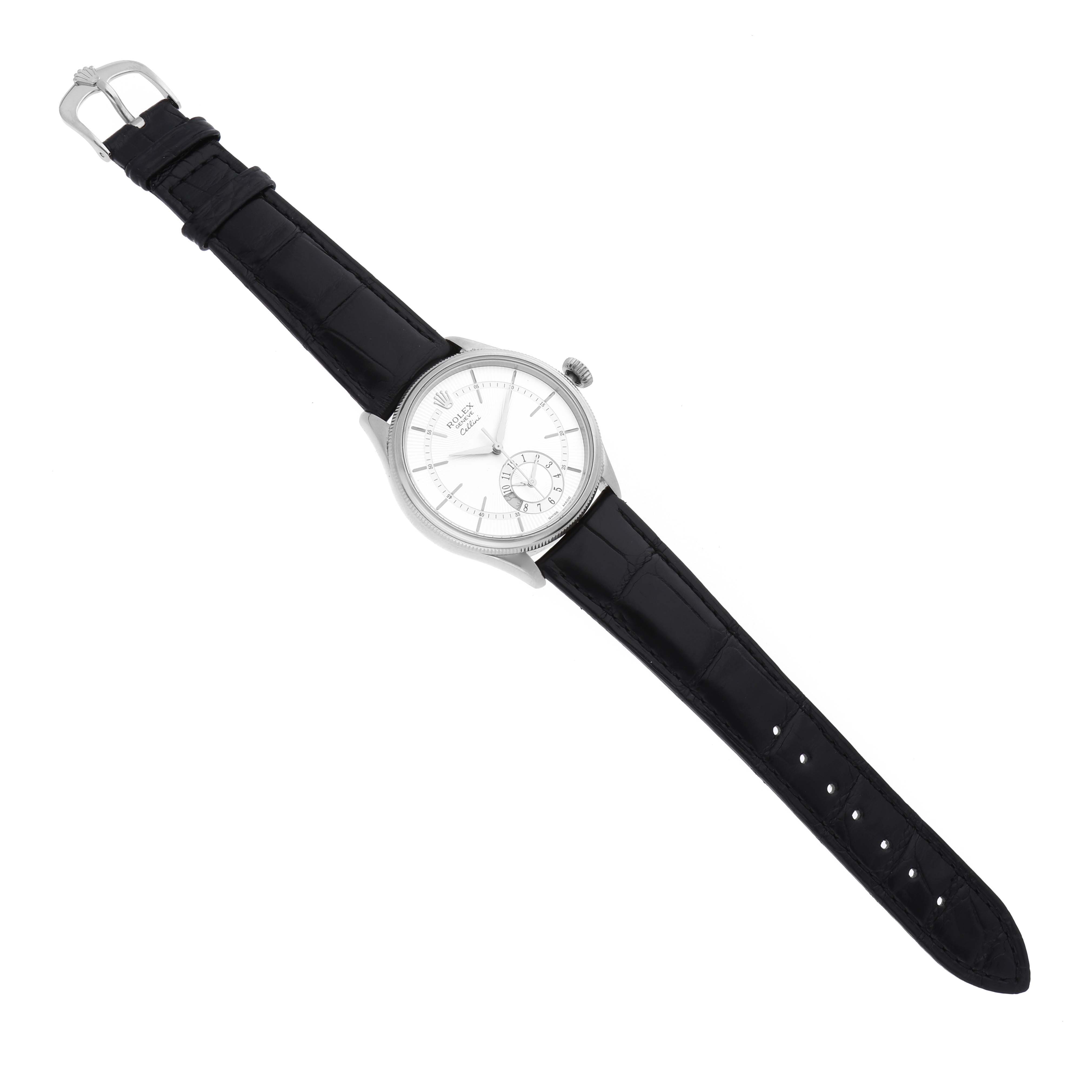 The Rolex Cellini 50529 Men's White Gold Silver Dial 50529 Men's White Gold Silver Dial watch is shown in a top-down angle, displaying the face, crown, and full black leather strap.