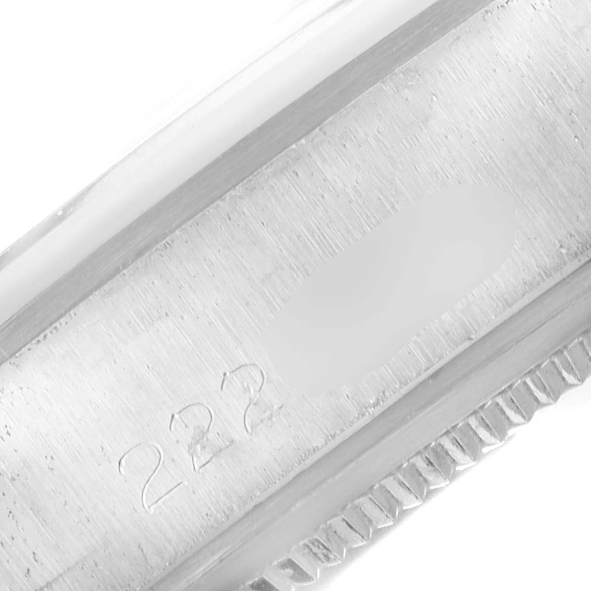 This image shows the side view of the case with engravings for the Vintage Collection model by Rolex.