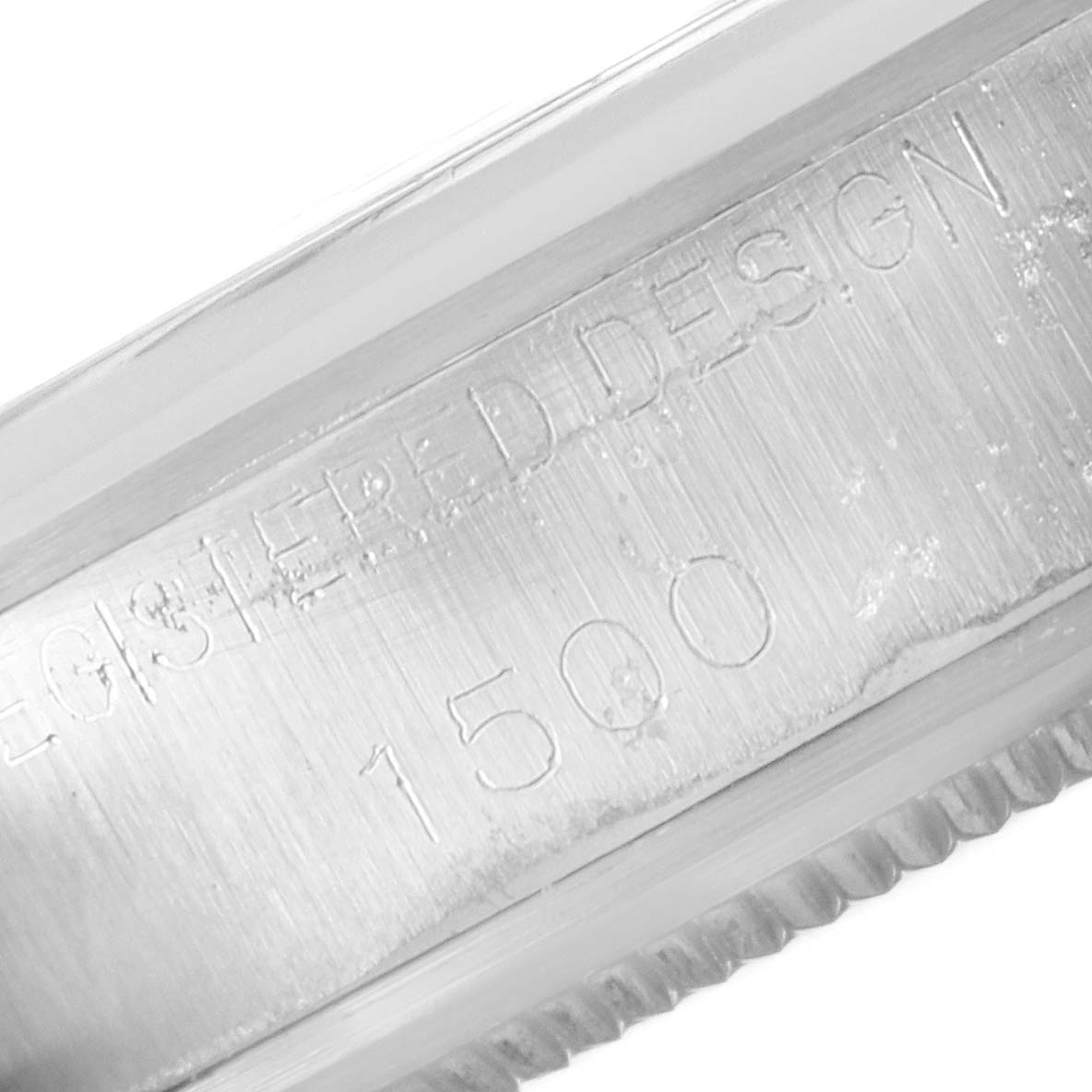 The image shows a close-up of the engraved model number "1500" on the case side of the Rolex Vintage Collection 1500 Men's Stainless Steel Black Dial 1500 Men's Stainless Steel Black Dial watch.