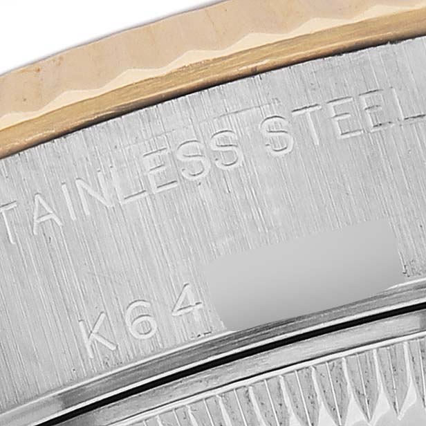 The image shows a close-up of the edge and side engraving details on a stainless steel Rolex Datejust 79173 Women's Stainless Steel Black Dial bezel.