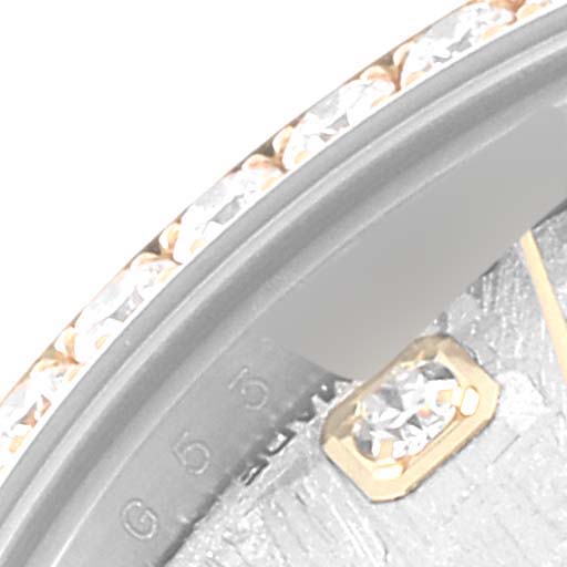 The image shows a close-up of the bezel and part of the dial of a Rolex Datejust 179383 Women's Steel and Gold (two tone) Silver Dial 179383 Women's Steel and Gold (two tone) Silver Dial watch, highlighting diamond accents.