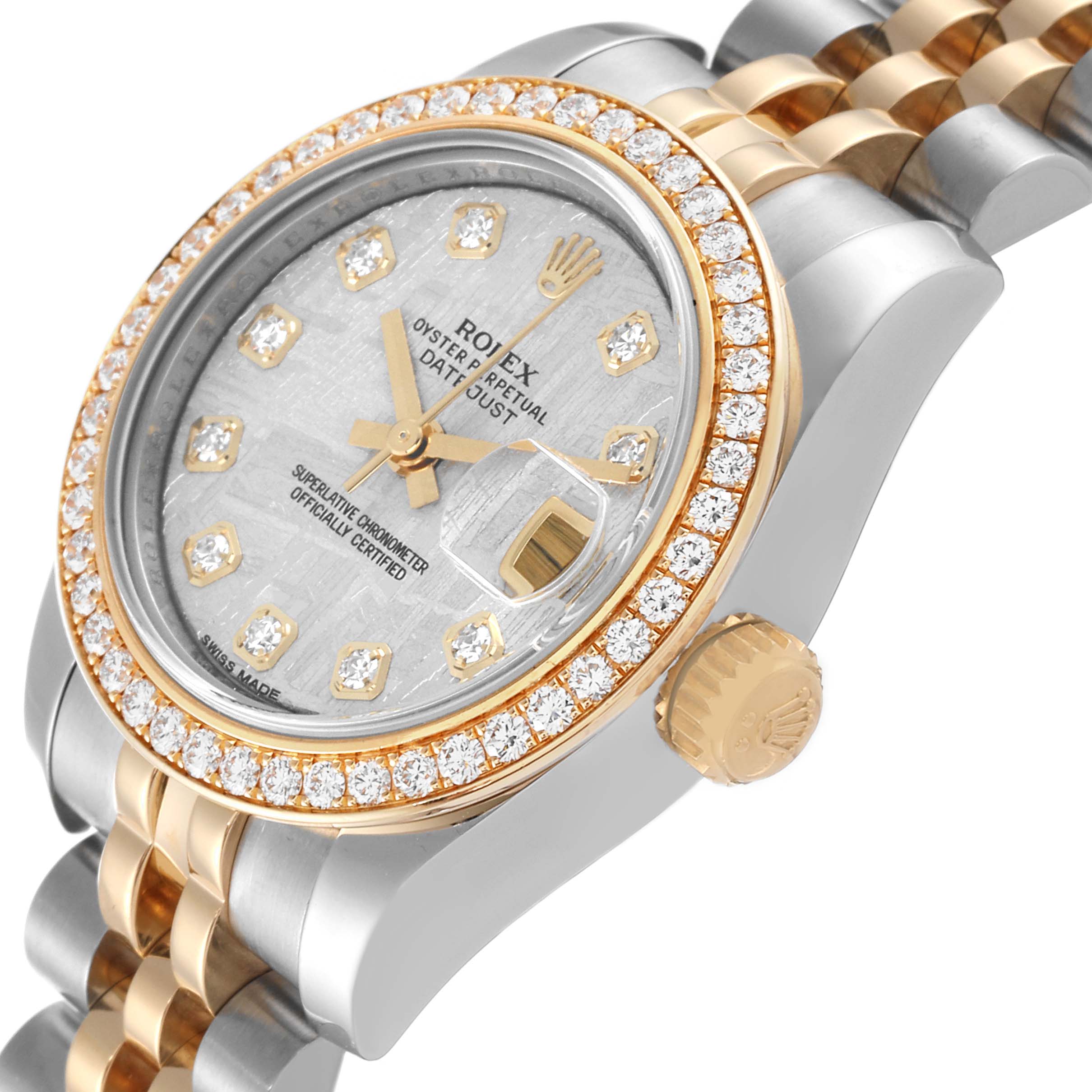 The image shows a close-up side angle of a Rolex Datejust 179383 Women's Steel and Gold (two tone) Silver Dial 179383 Women's Steel and Gold (two tone) Silver Dial watch, highlighting its bejeweled bezel, crown, and dial.