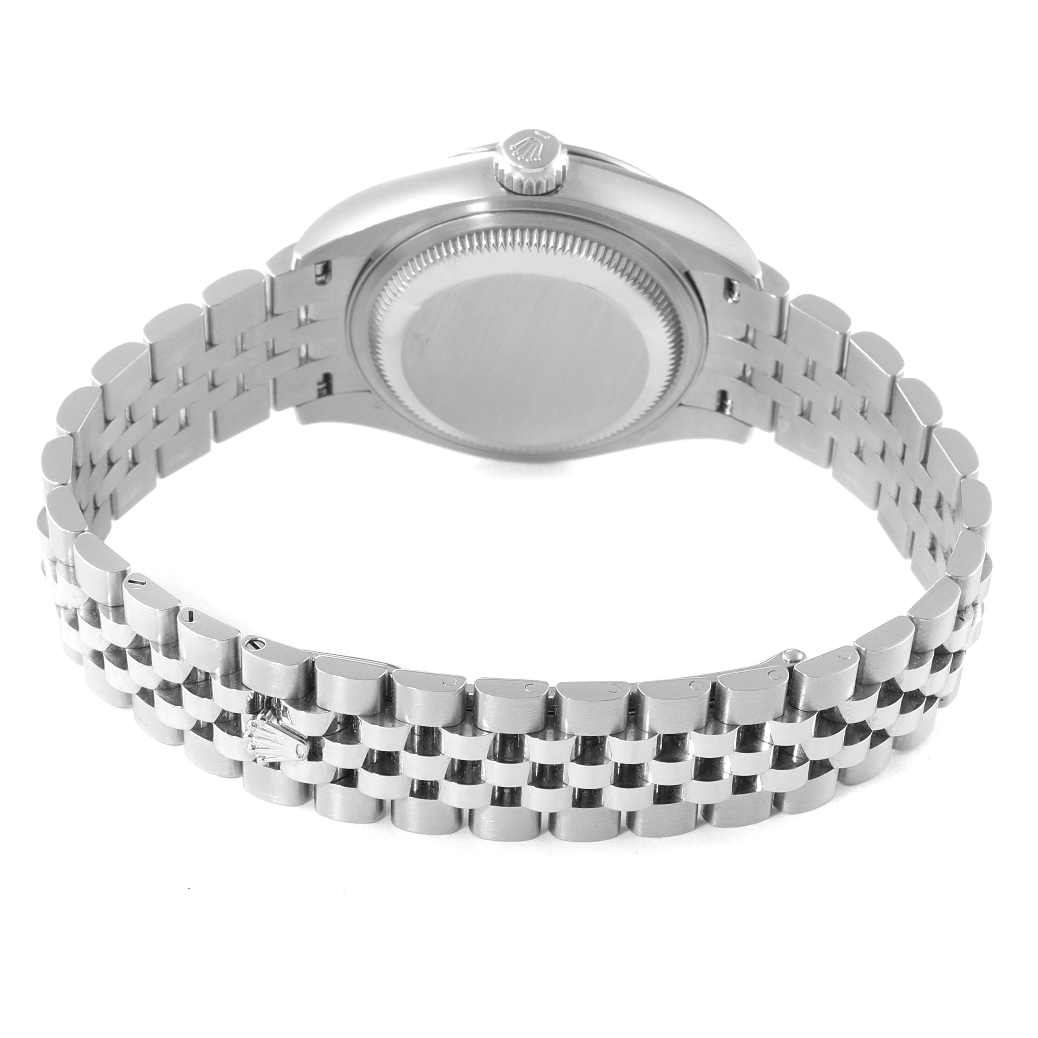 The watch is a Rolex Datejust 279174 Women's Stainless Steel Grey Dial 279174 Women's Stainless Steel Grey Dial model shown from the back, highlighting its case back, crown, and Jubilee bracelet.