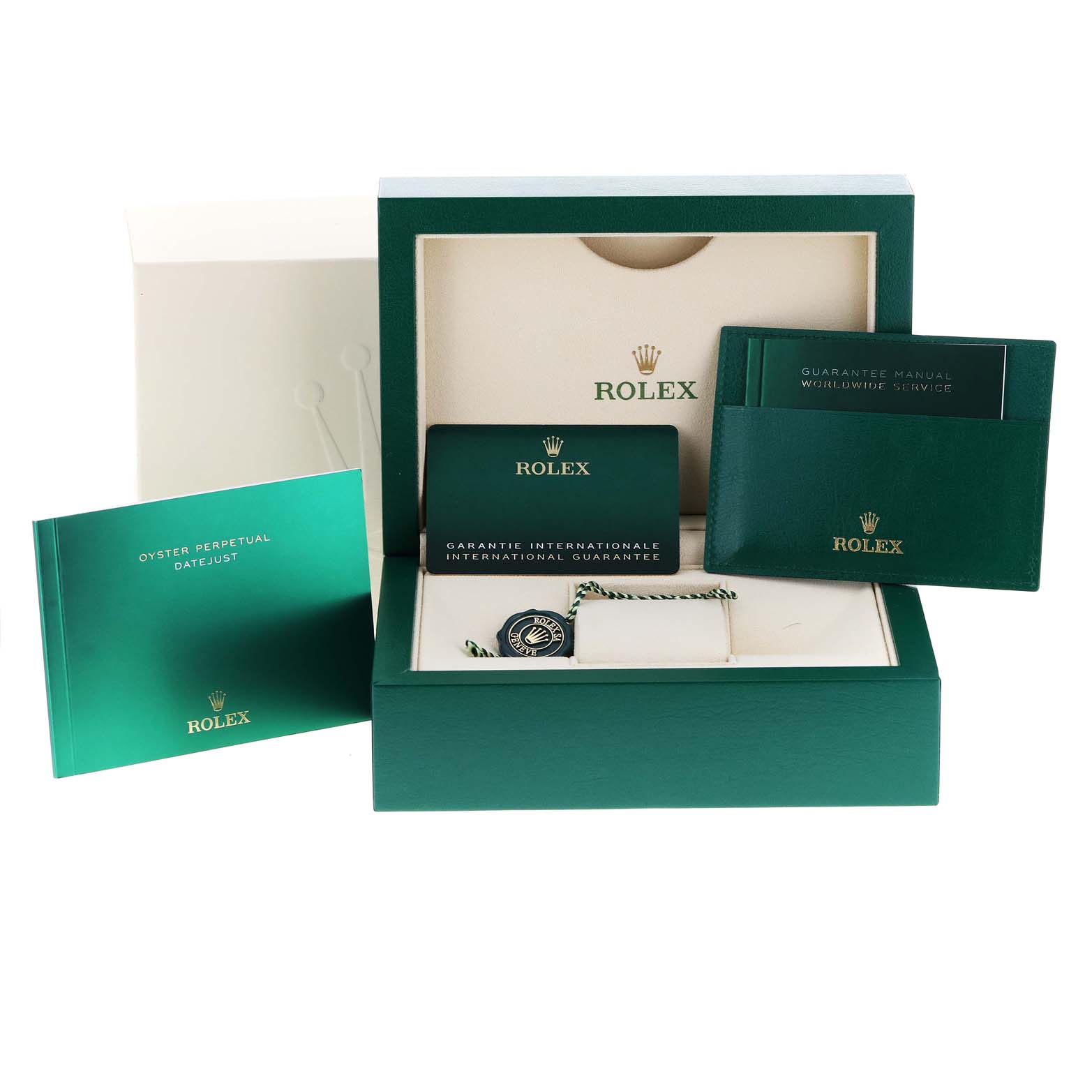 This image shows the packaging contents of a mid-size Rolex watch model, including manuals, guarantee card, and presentation box.