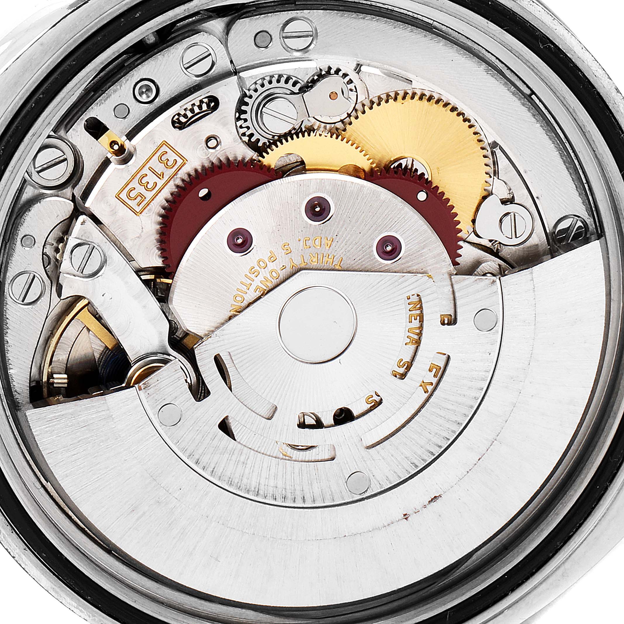This image shows the internal mechanical movement of a Rolex Datejust 116200 Men's Stainless Steel Silver Dial 116200 Men's Stainless Steel Silver Dial watch, highlighting its gears and rotor.