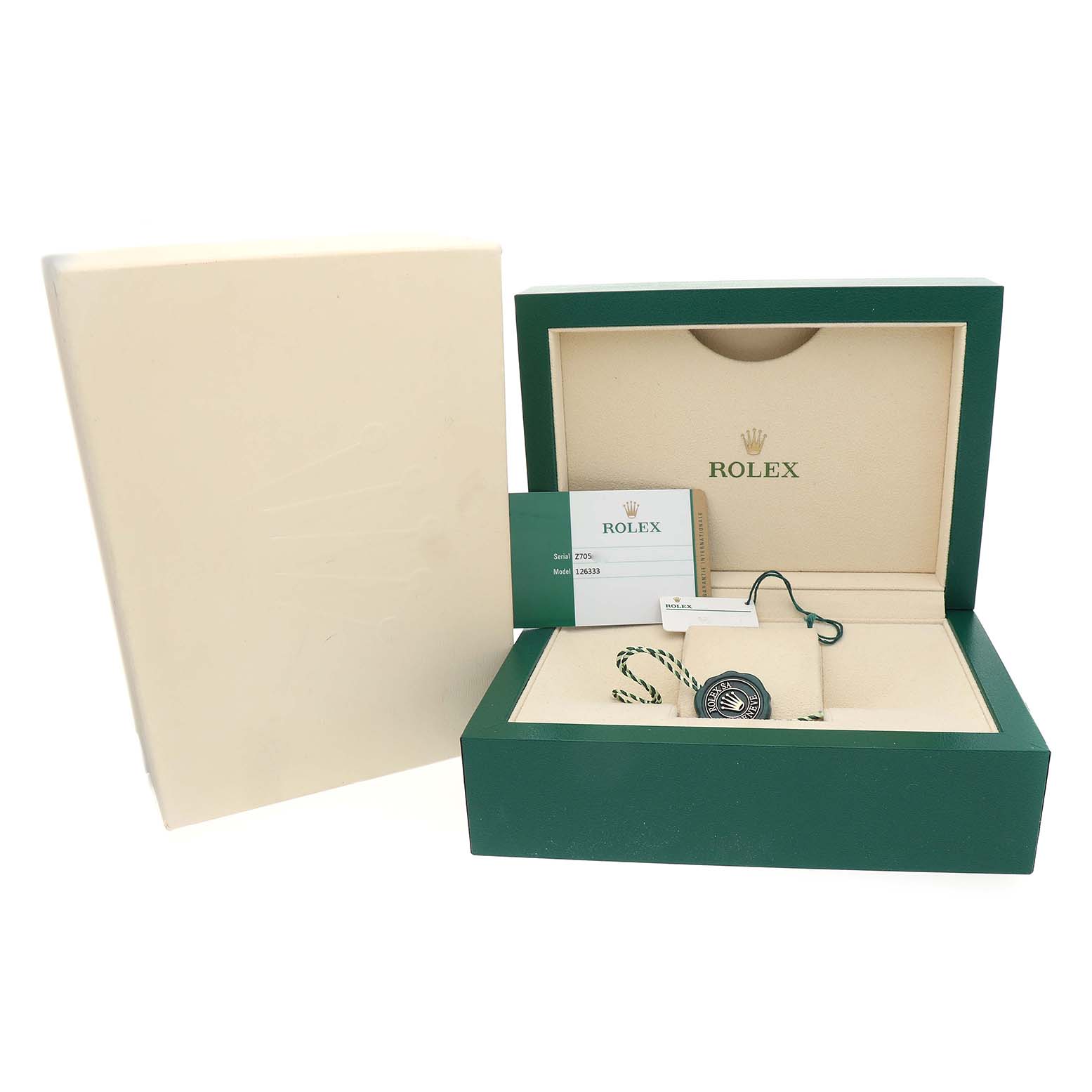 The image shows the open box and accessories for a Rolex Datejust 41 126333 Men's Steel and Gold (two tone) Black Dial, including authentication cards and tags.