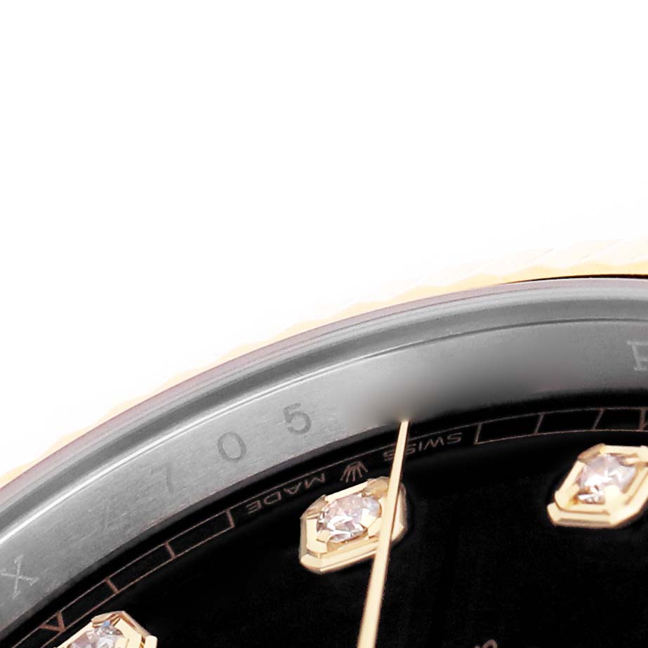The image shows a close-up of the dial edge and diamond markers of the Rolex Datejust 41 126333 Men's Steel and Gold (two tone) Black Dial.