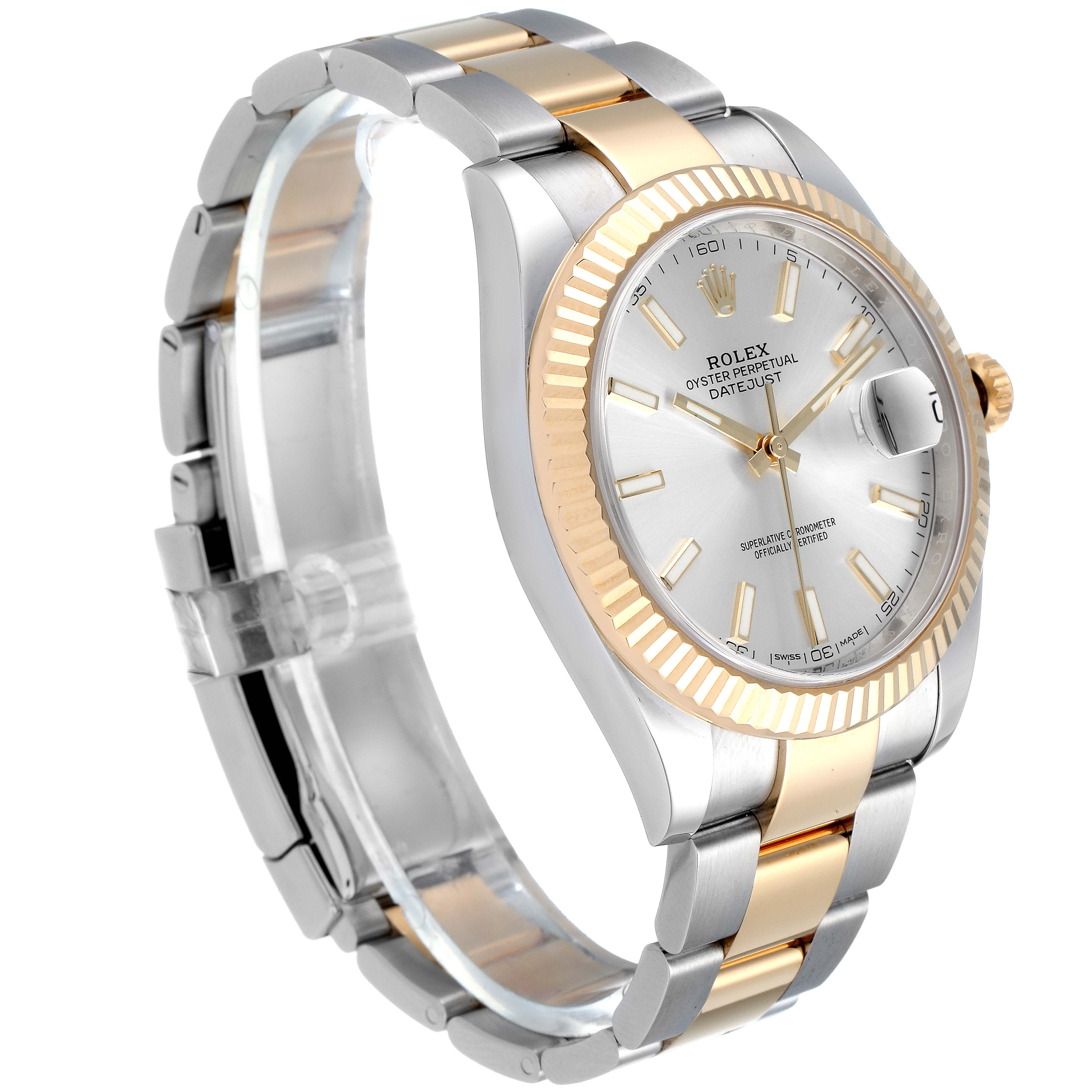 The Rolex Datejust 41 126333 Men
s Steel and Gold (two tone) Silver Dial 126333 Men
s Steel and Gold (two tone) Silver Dial is shown at a three-quarter angle, highlighting its gold bezel, dial, and two-tone bracelet.