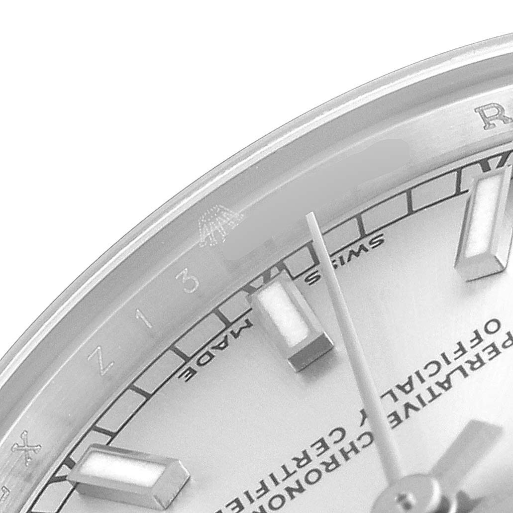 The image shows the upper-left quadrant of the dial and hands of a Rolex Mid-Size 178240 Women's Stainless Steel Silver Dial 178240 Women's Stainless Steel Silver Dial watch at an angled close-up.