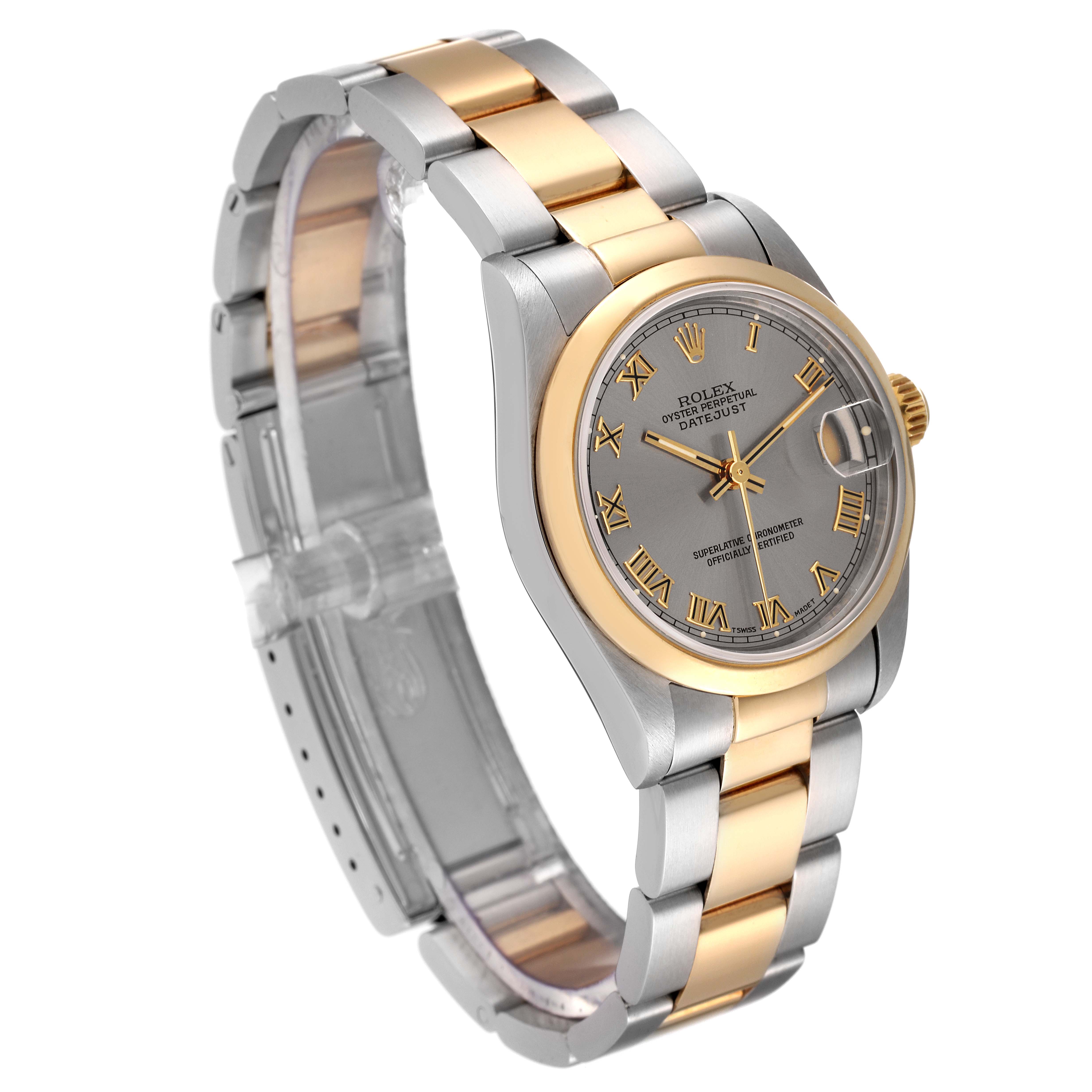 The image shows a side angle view of a Rolex Mid-Size 68243 Women's Steel and Gold (two tone) Silver Dial 68243 Women's Steel and Gold (two tone) Silver Dial watch with a two-tone metal bracelet and a grey dial.
