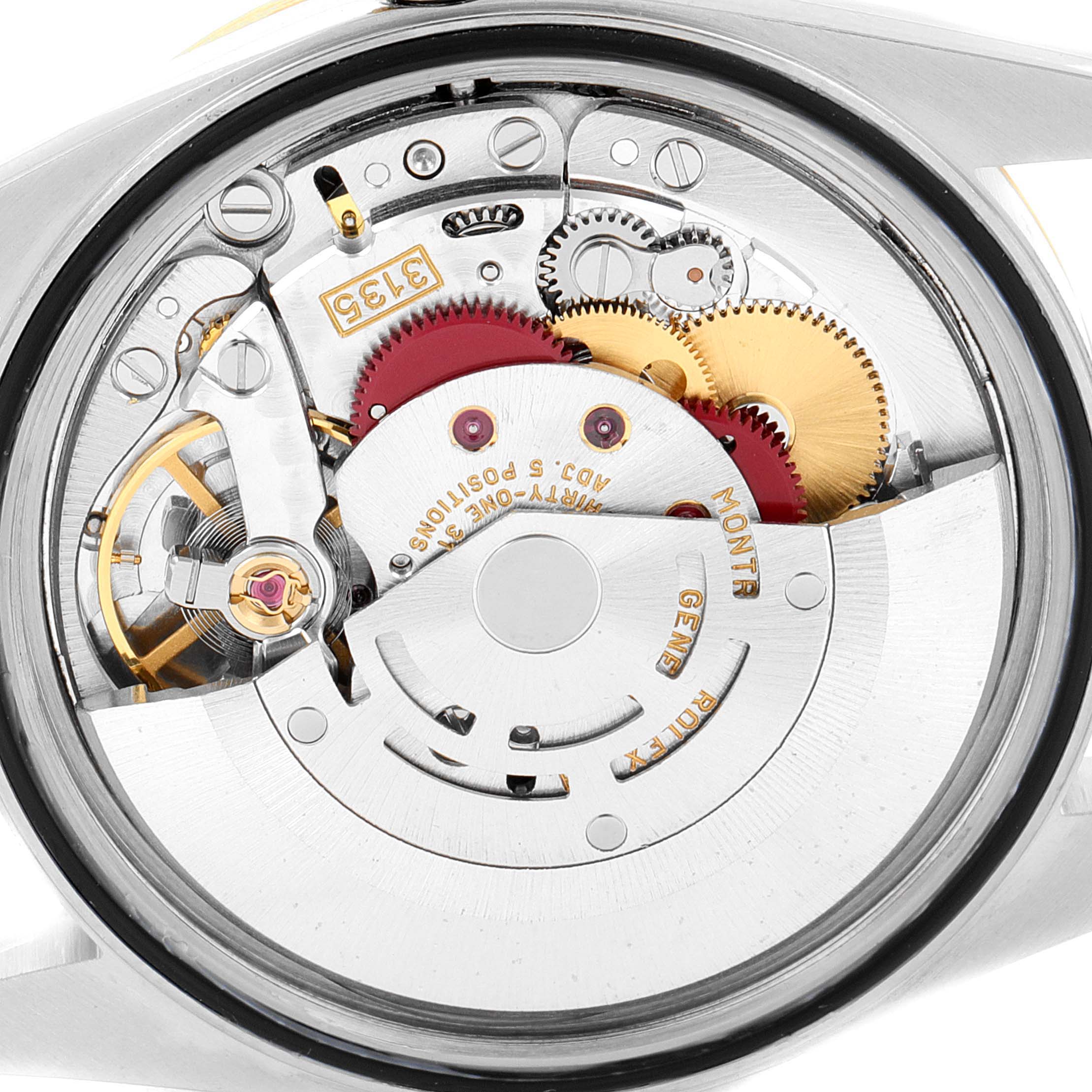 This image shows the movement and inner mechanics of a Rolex Datejust 16233 Men's Steel and Gold (two tone) Champagne Dial 16233 Men's Steel and Gold (two tone) Champagne Dial watch from a back angle.