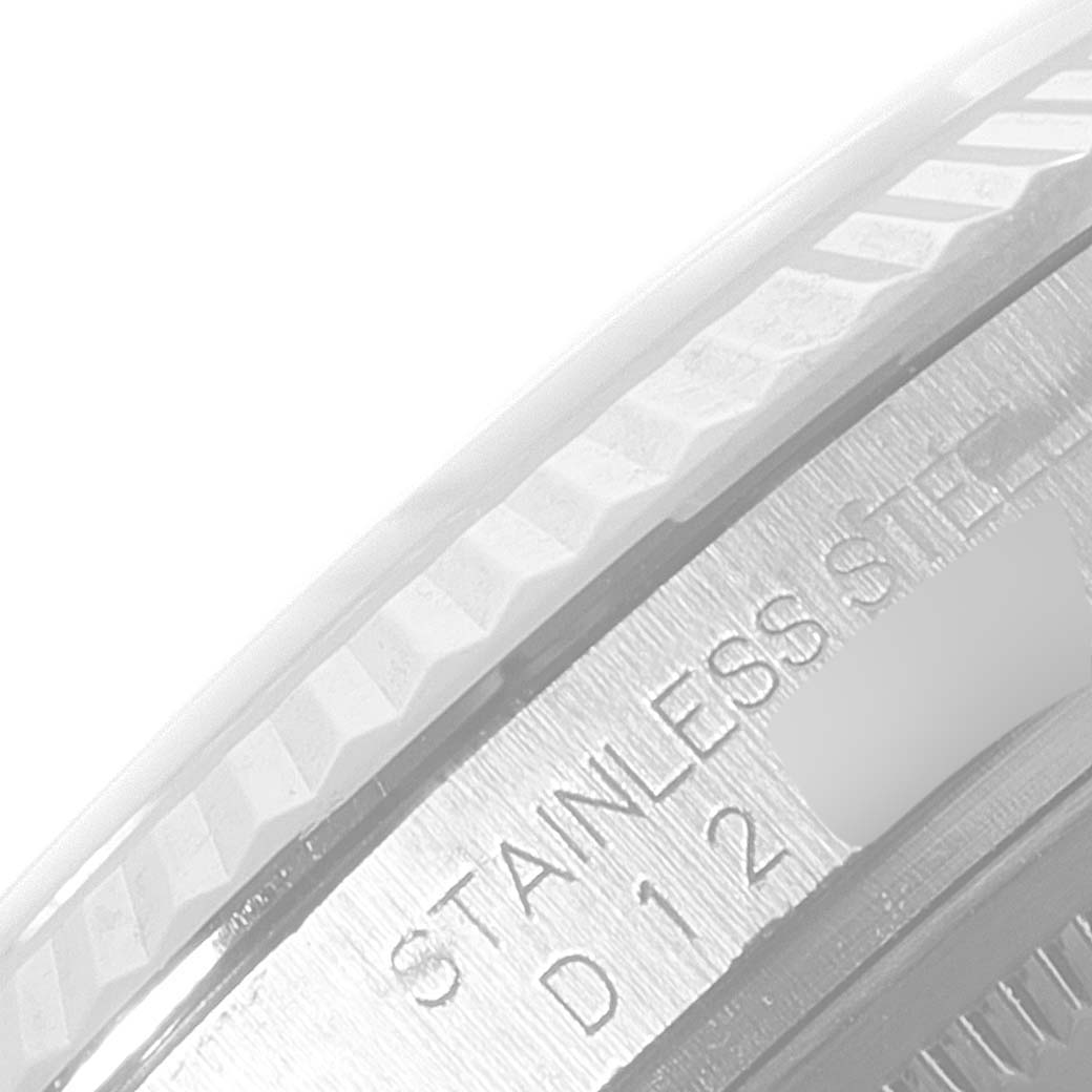 This image shows a close-up of the side details and bezel of the Rolex Datejust 116234 Men's Stainless Steel Silver Dial 116234 Men's Stainless Steel Silver Dial watch, highlighting its stainless steel construction.