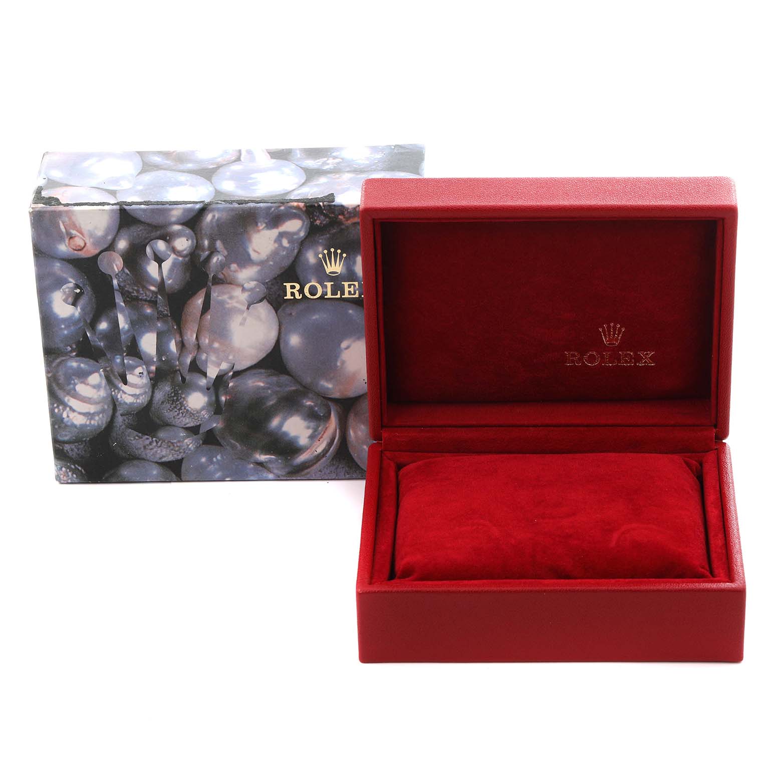 The image shows a Rolex Datejust 69174 Women's Stainless Steel Silver Dial 69174 Women's Stainless Steel Silver Dial watch box and outer box at an angle, with focus on the red interior and textured outer design.