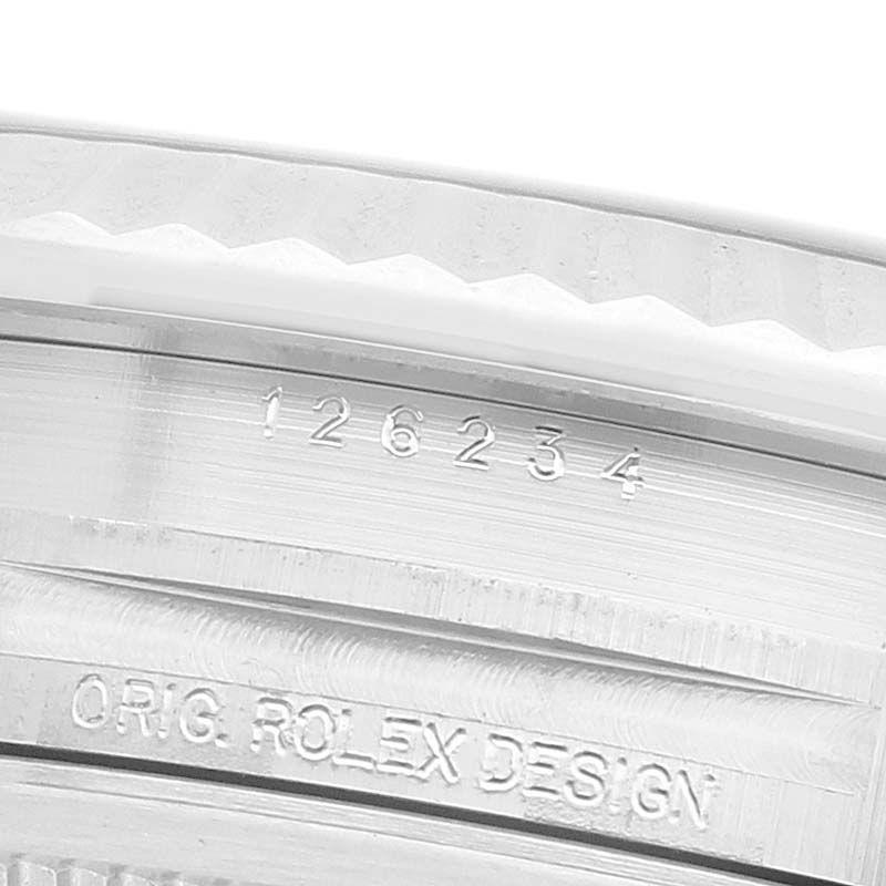 The image shows a close-up of the Rolex Datejust 126234 Men's Stainless Steel Silver Dial's inner bezel with model engraving details.