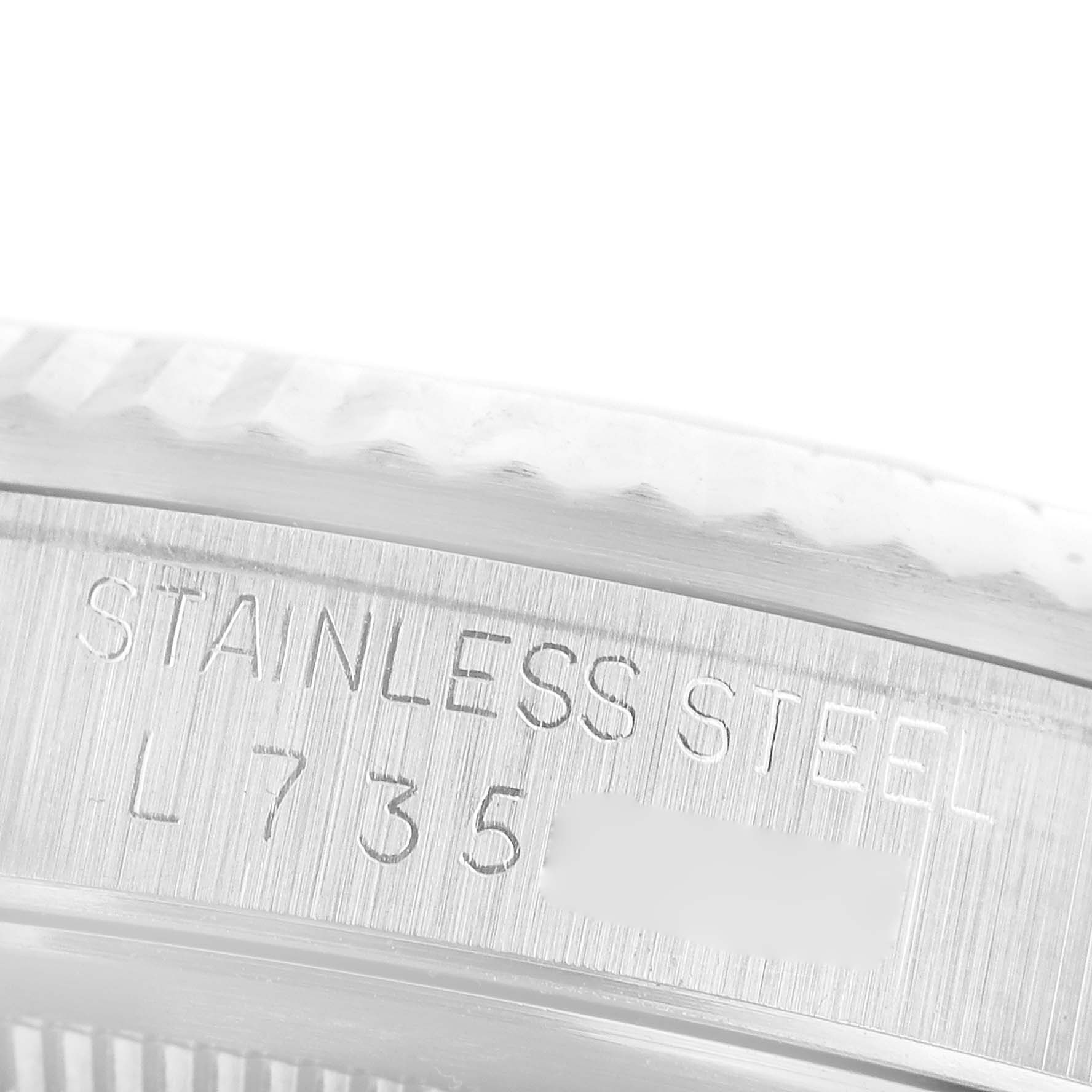 The image shows a close-up shot of the stainless steel case back with engravings on a Rolex Datejust 16234 Men's Stainless Steel Silver Dial 16234 Men's Stainless Steel Silver Dial watch.