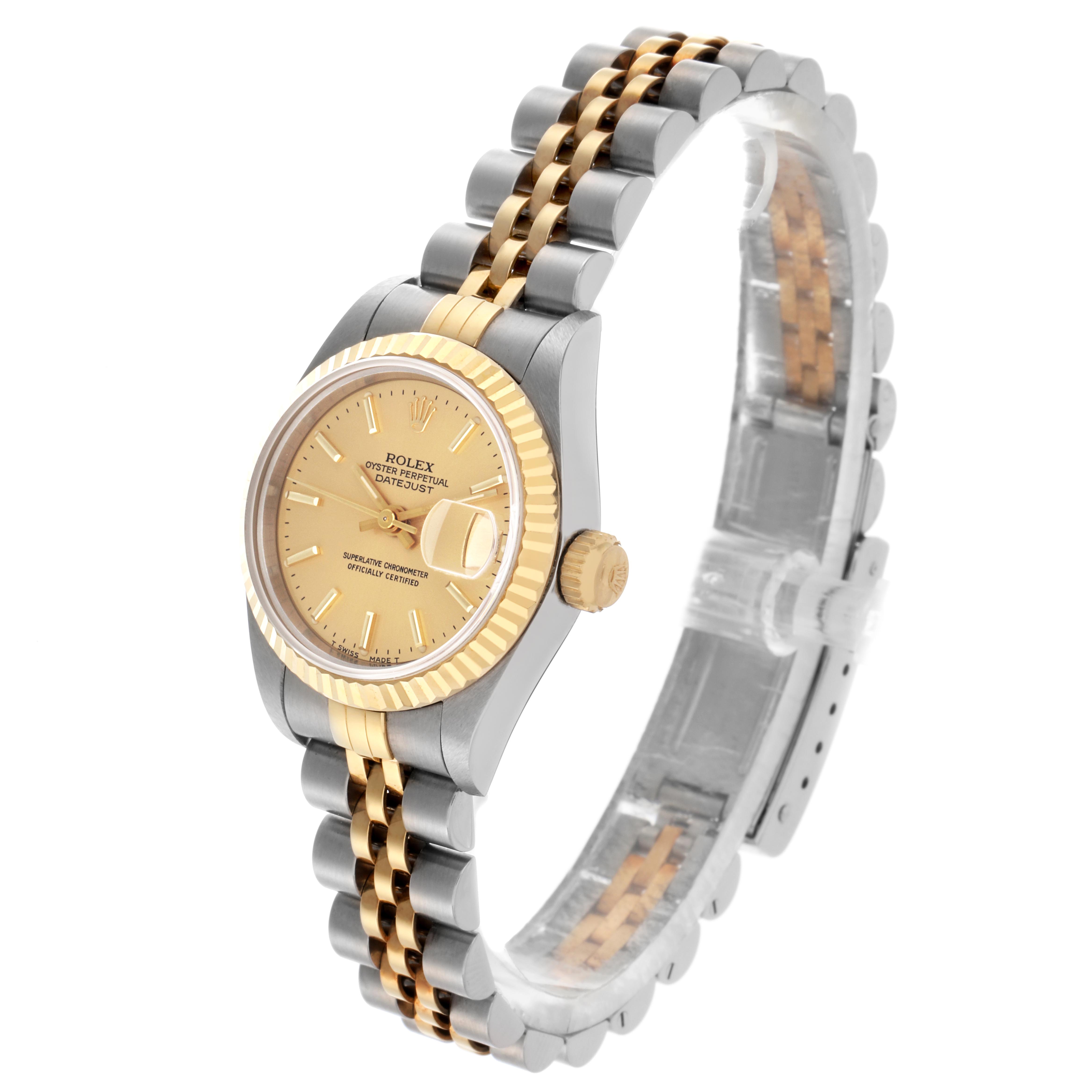 The Rolex Datejust 69173 Women's Steel and Gold (two tone) Champagne Dial 69173 Women's Steel and Gold (two tone) Champagne Dial watch is shown at a three-quarter angle, displaying the dial, fluted bezel, and Jubilee bracelet.