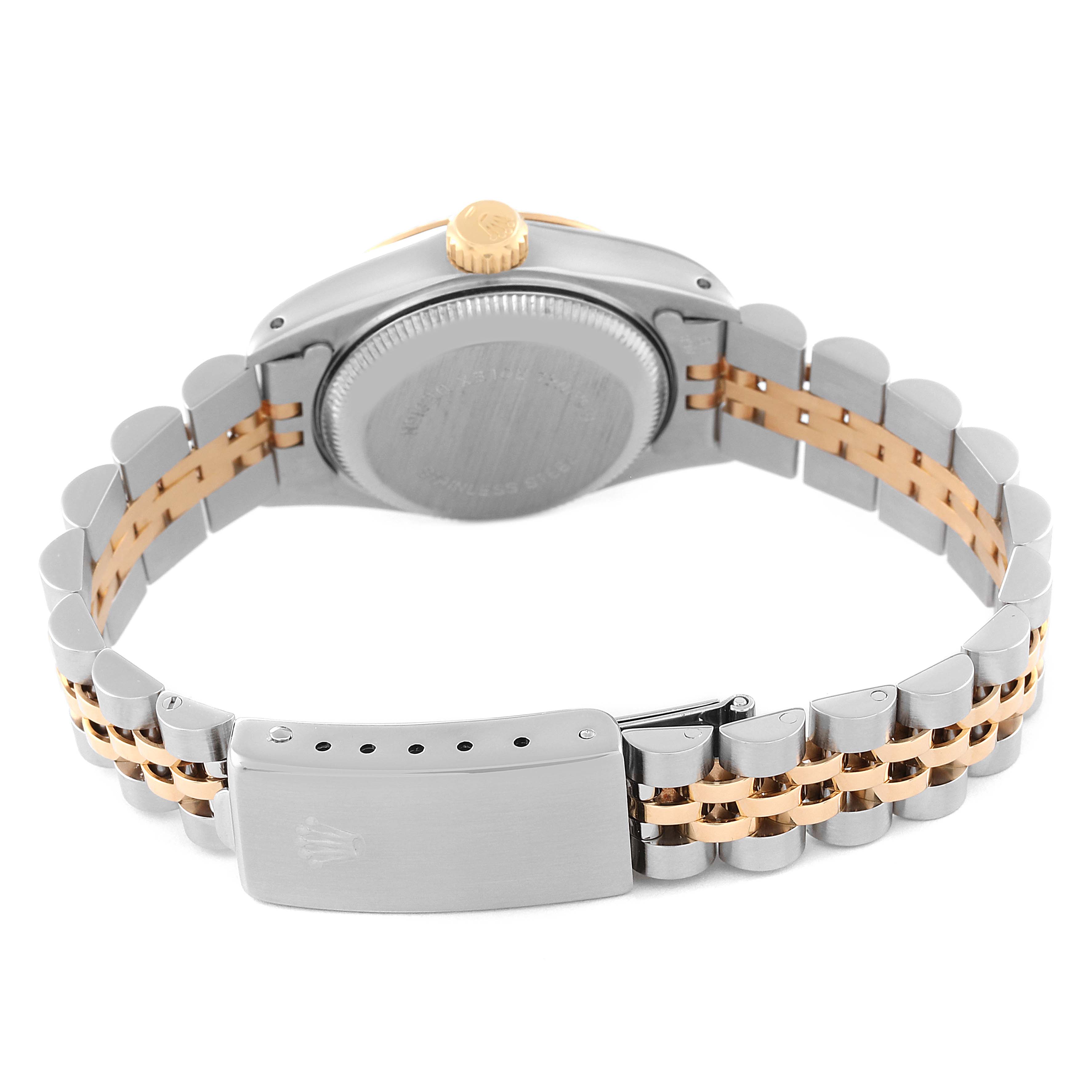 This is a rear view of a Rolex Datejust 69173 Women's Steel and Gold (two tone) Champagne Dial 69173 Women's Steel and Gold (two tone) Champagne Dial watch, showing the case back, crown, and two-tone bracelet.