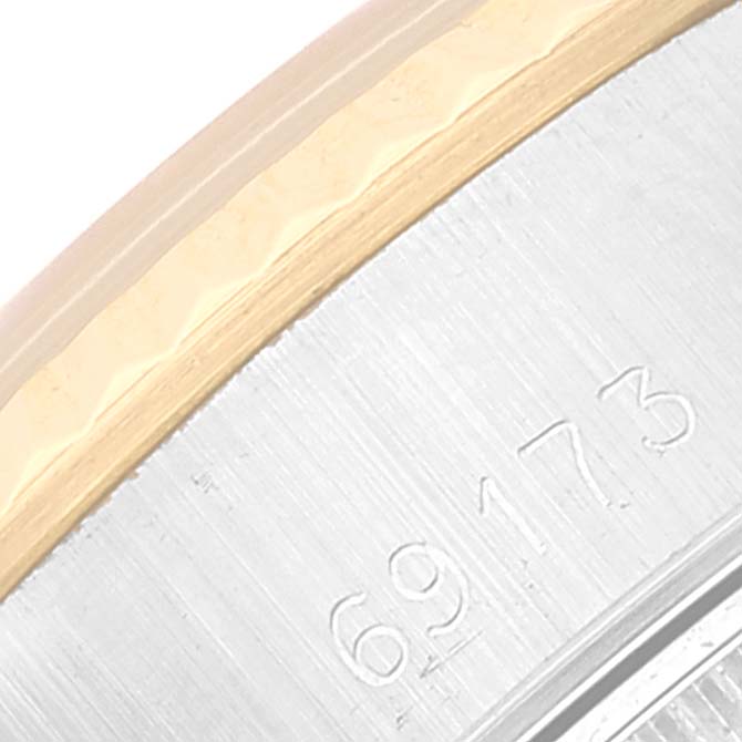 The image shows a close-up of the bezel and part of the serial number of a Rolex Datejust 69173 Women's Steel and Gold (two tone) Champagne Dial 69173 Women's Steel and Gold (two tone) Champagne Dial watch.