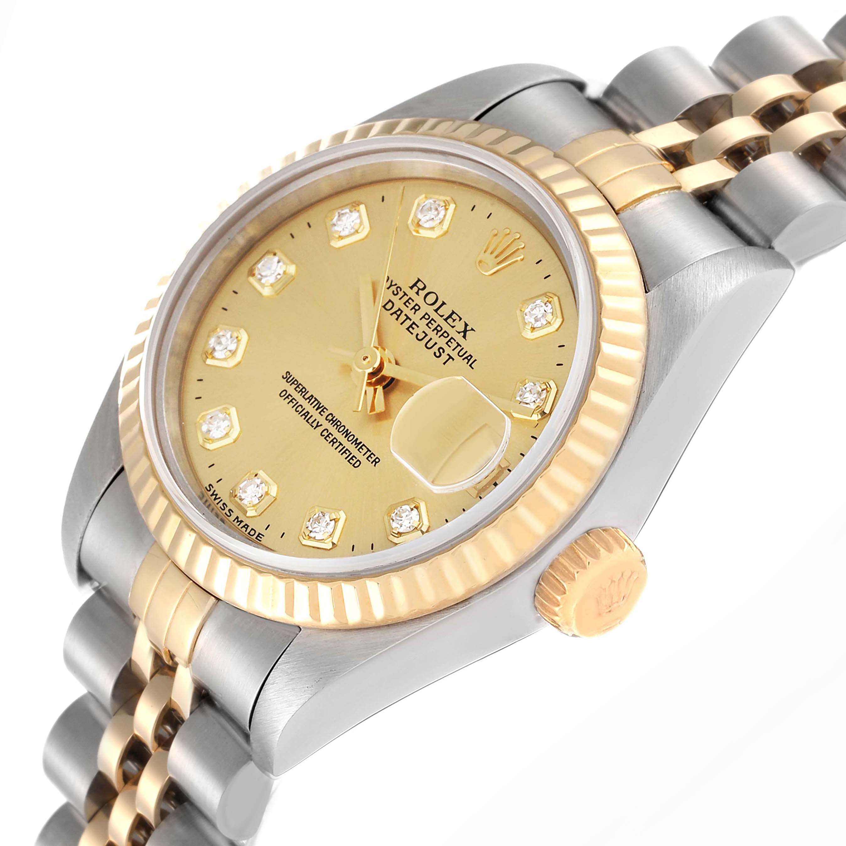 The Rolex Datejust 69173 Women's Steel and Gold (two tone) Champagne Dial 69173 Women's Steel and Gold (two tone) Champagne Dial watch is shown at a tilted angle displaying the gold dial, fluted bezel, and two-tone bracelet.