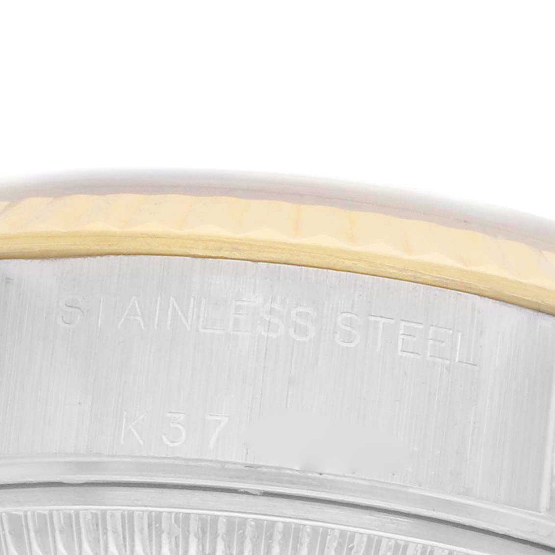 The image shows a close-up of the side of a Rolex Datejust 79173 Women's Steel and Gold (two tone) Silver Dial 79173 Women's Steel and Gold (two tone) Silver Dial watch, focusing on the stainless steel case and part of the bezel.