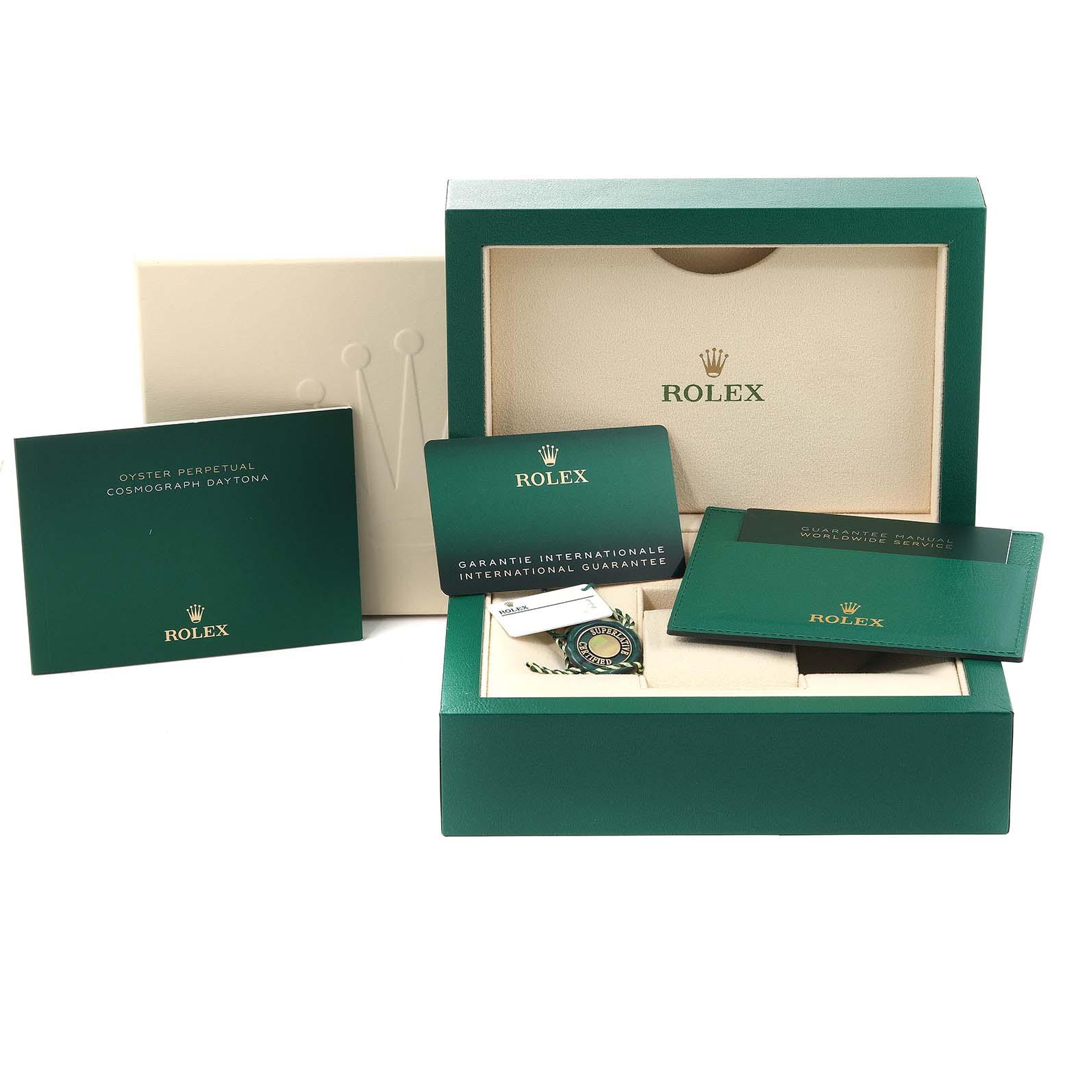 The image shows the packaging, warranty cards, tag, and manuals for a Rolex Daytona 116500 Men's Stainless Steel White Dial 116500 Men's Stainless Steel White Dial watch, all displayed at a front angle.